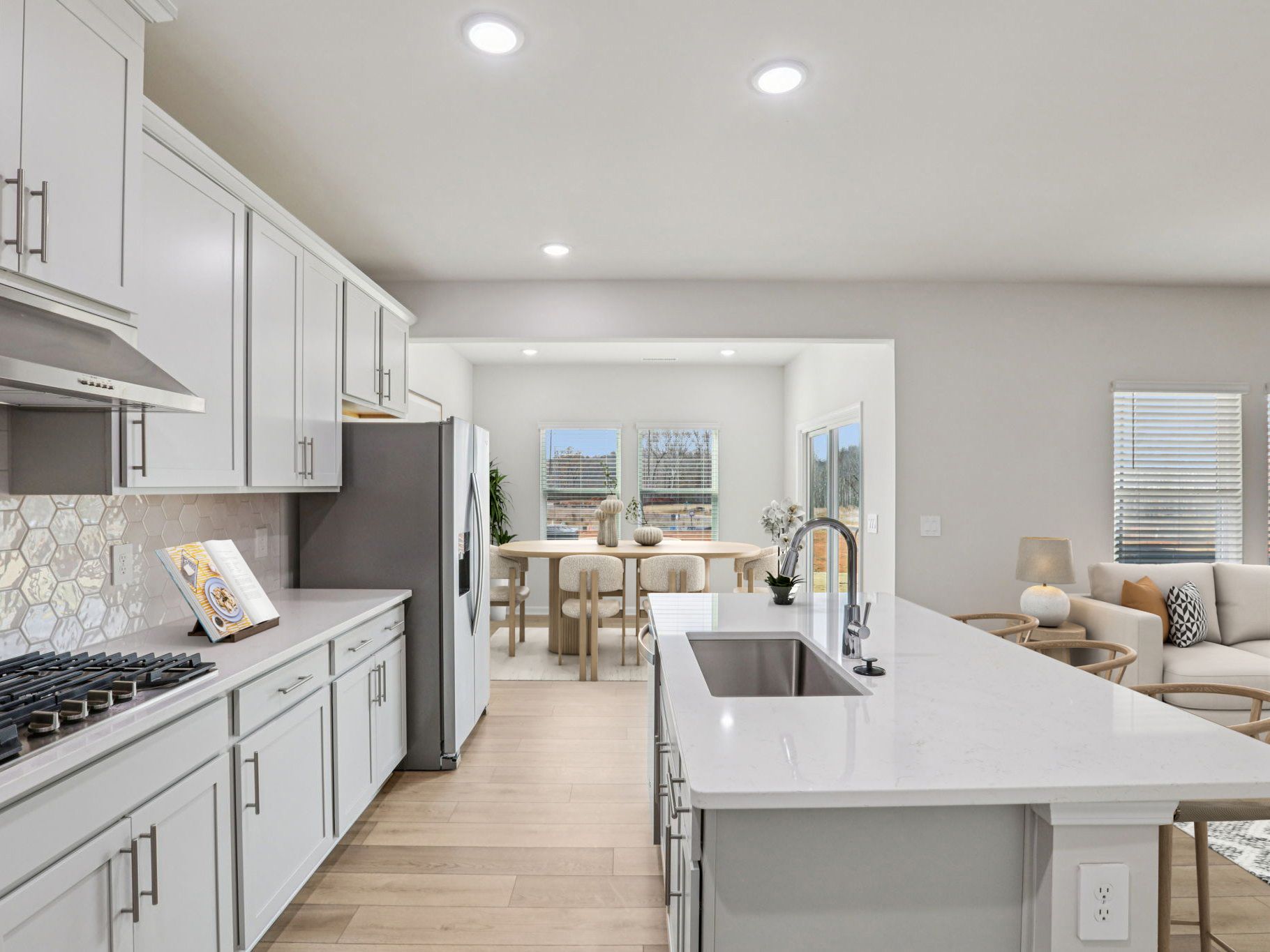 Kitchen in the Dallas floorplan at a Meritage Homes community in Garner, NC.