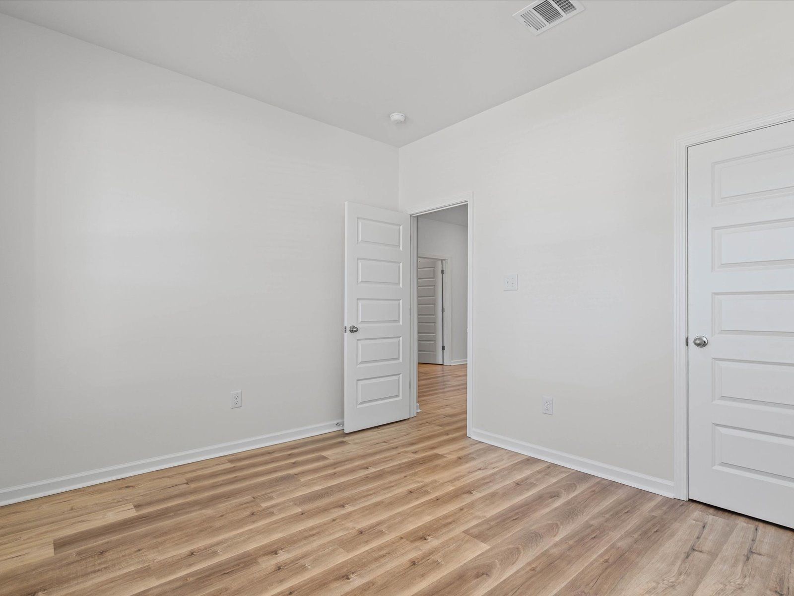 Secondary bedroom in the Sandpiper floorplan at a Meritage Homes community in Biloxi, MS.