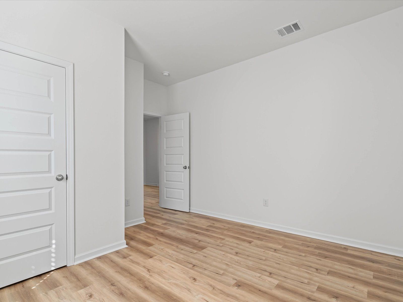 Secondary bedroom in the Sandpiper floorplan at a Meritage Homes community in Biloxi, MS.