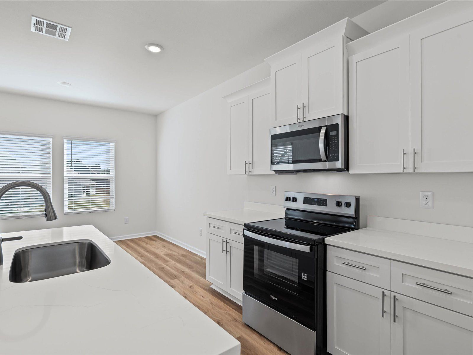 Kitchen in the Sandpiper floorplan at a Meritage Homes community in Biloxi, MS.