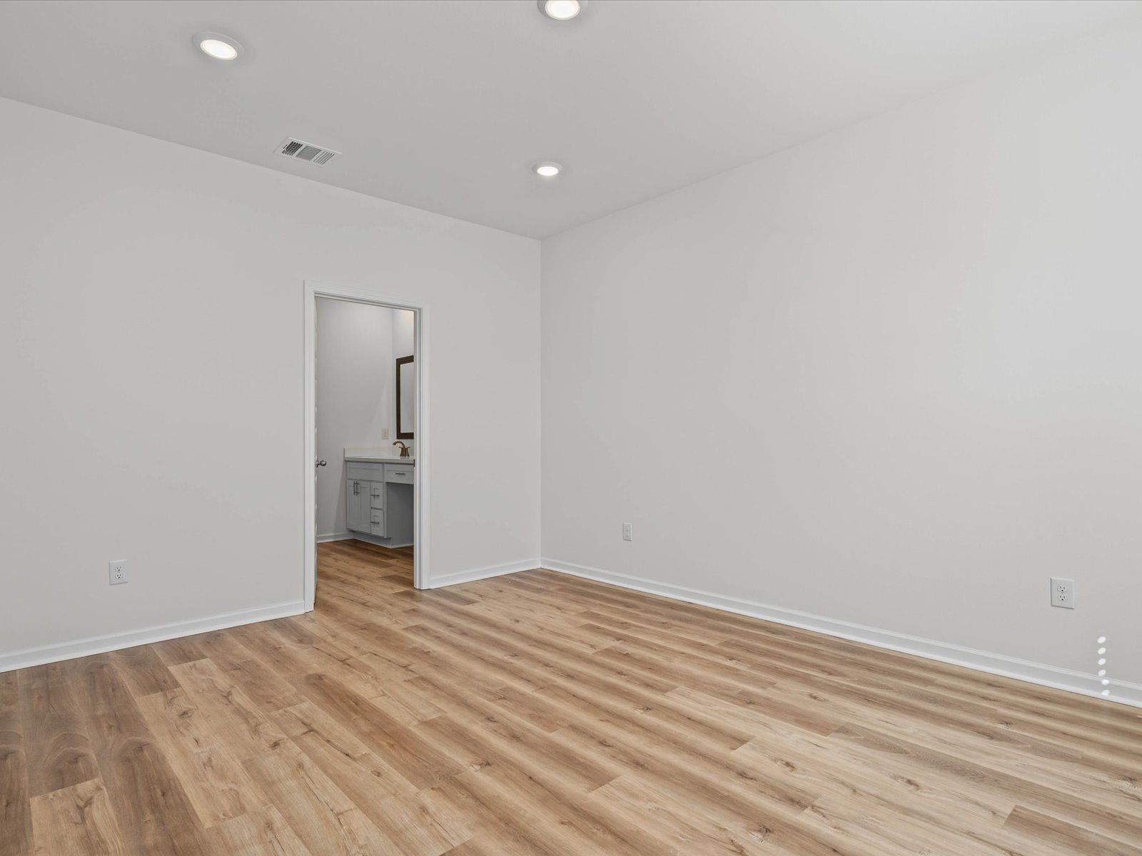 Primary bedroom in the Sandpiper floorplan at a Meritage Homes community in Biloxi, MS.