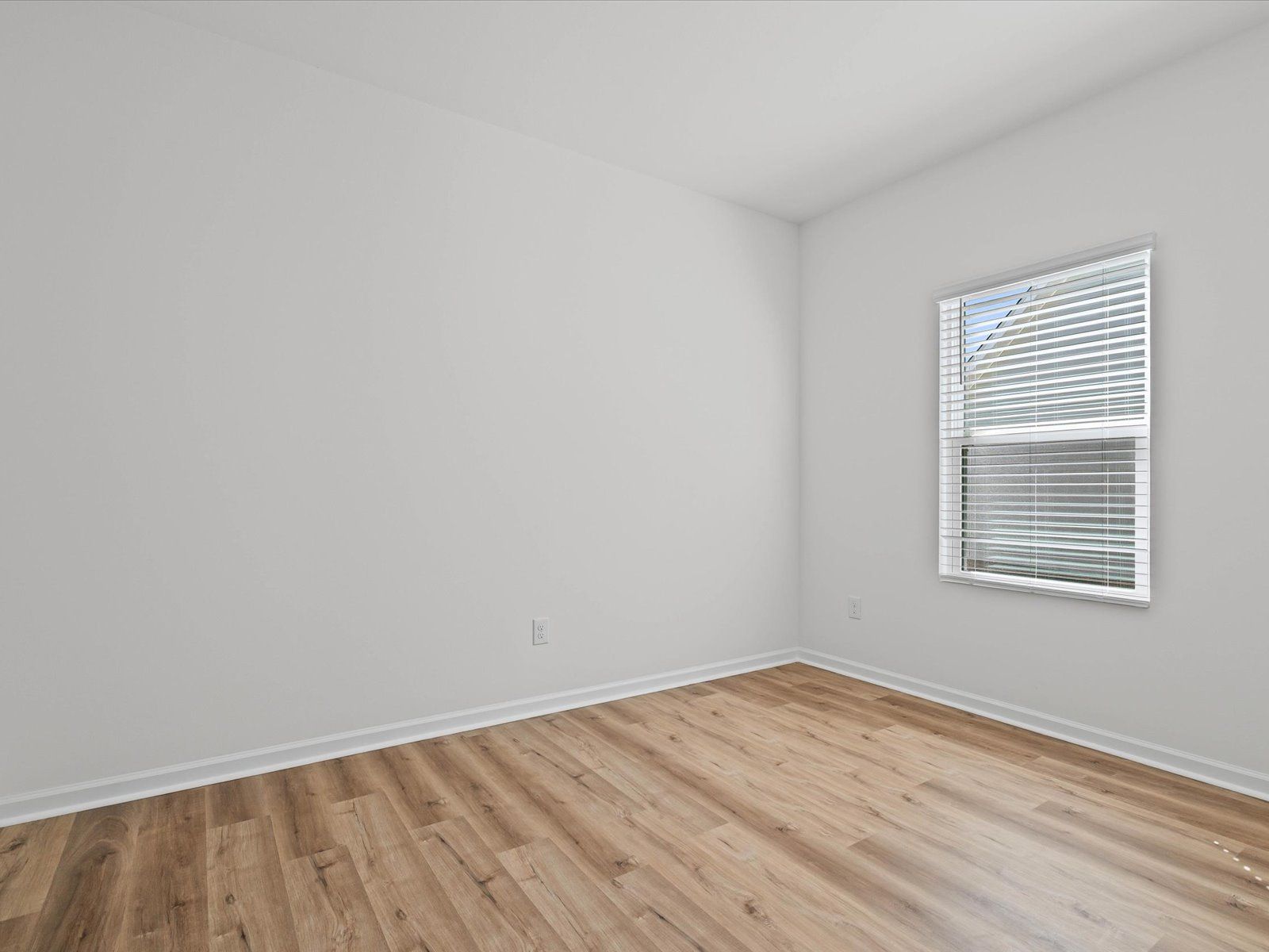 Secondary bedroom in the Sandpiper floorplan at a Meritage Homes community in Biloxi, MS.