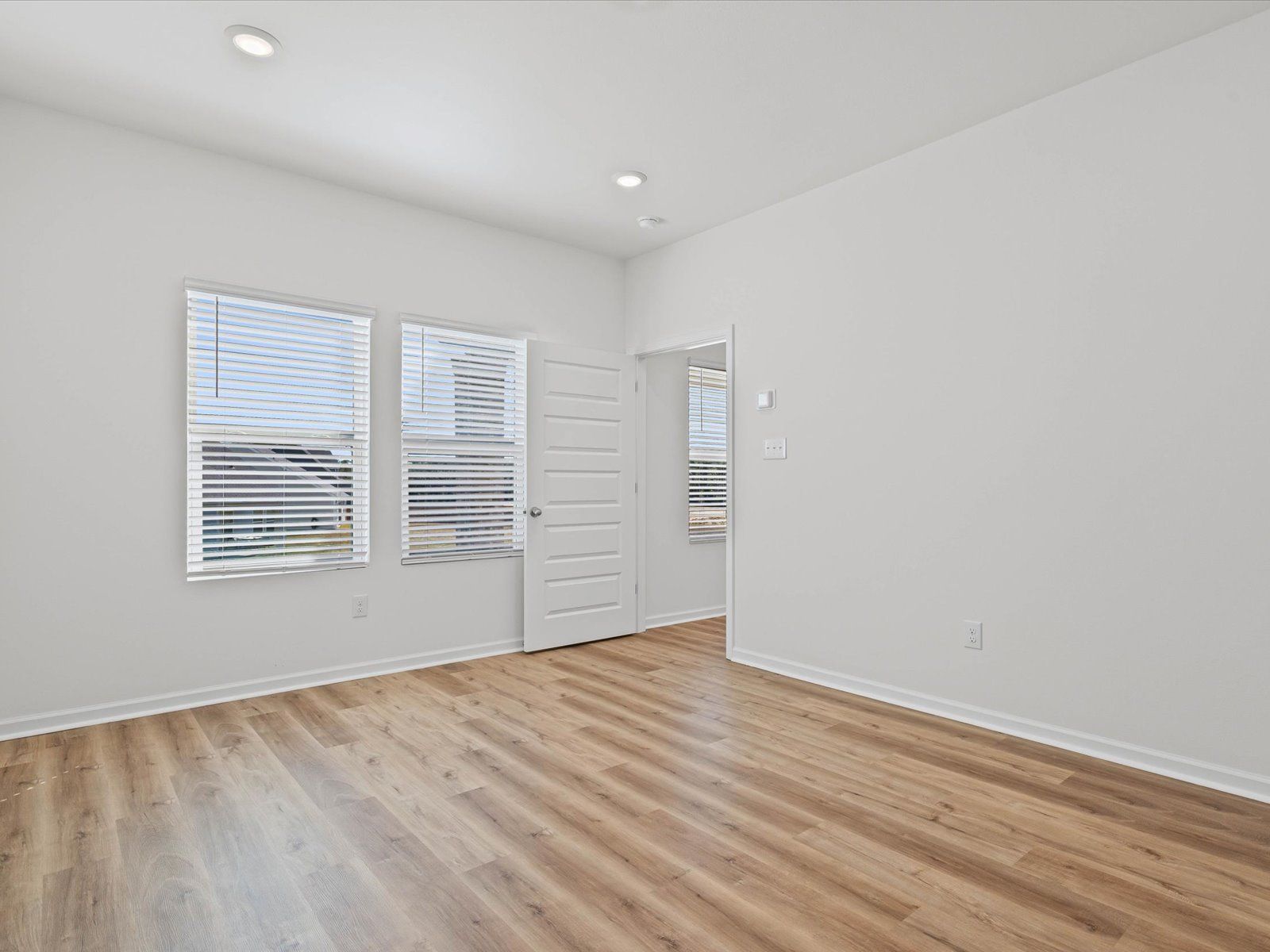 Primary bedroom in the Sandpiper floorplan at a Meritage Homes community in Biloxi, MS.