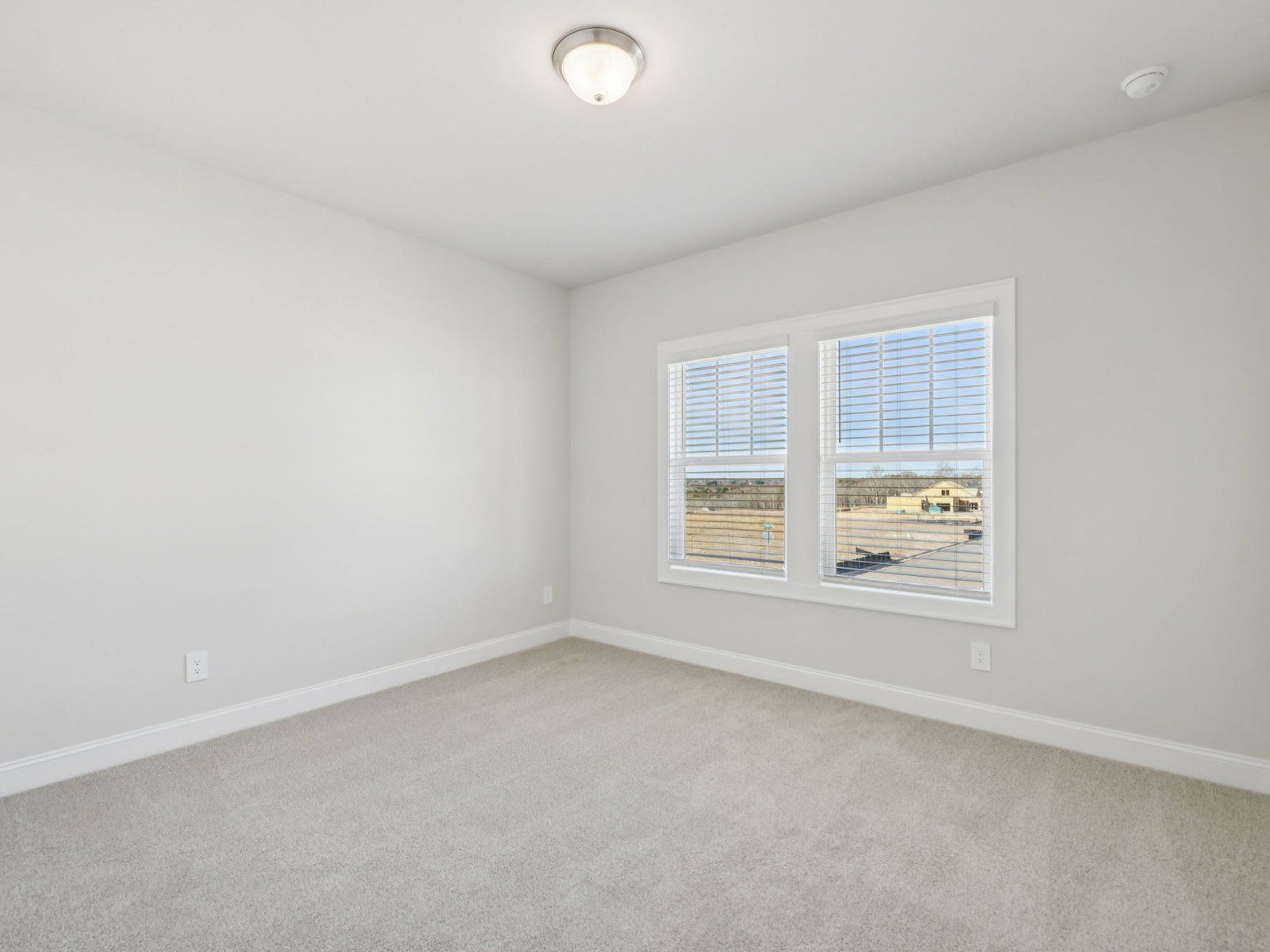The Orchard Park floorplan with the Elegant Minimalism Slate interior package.
