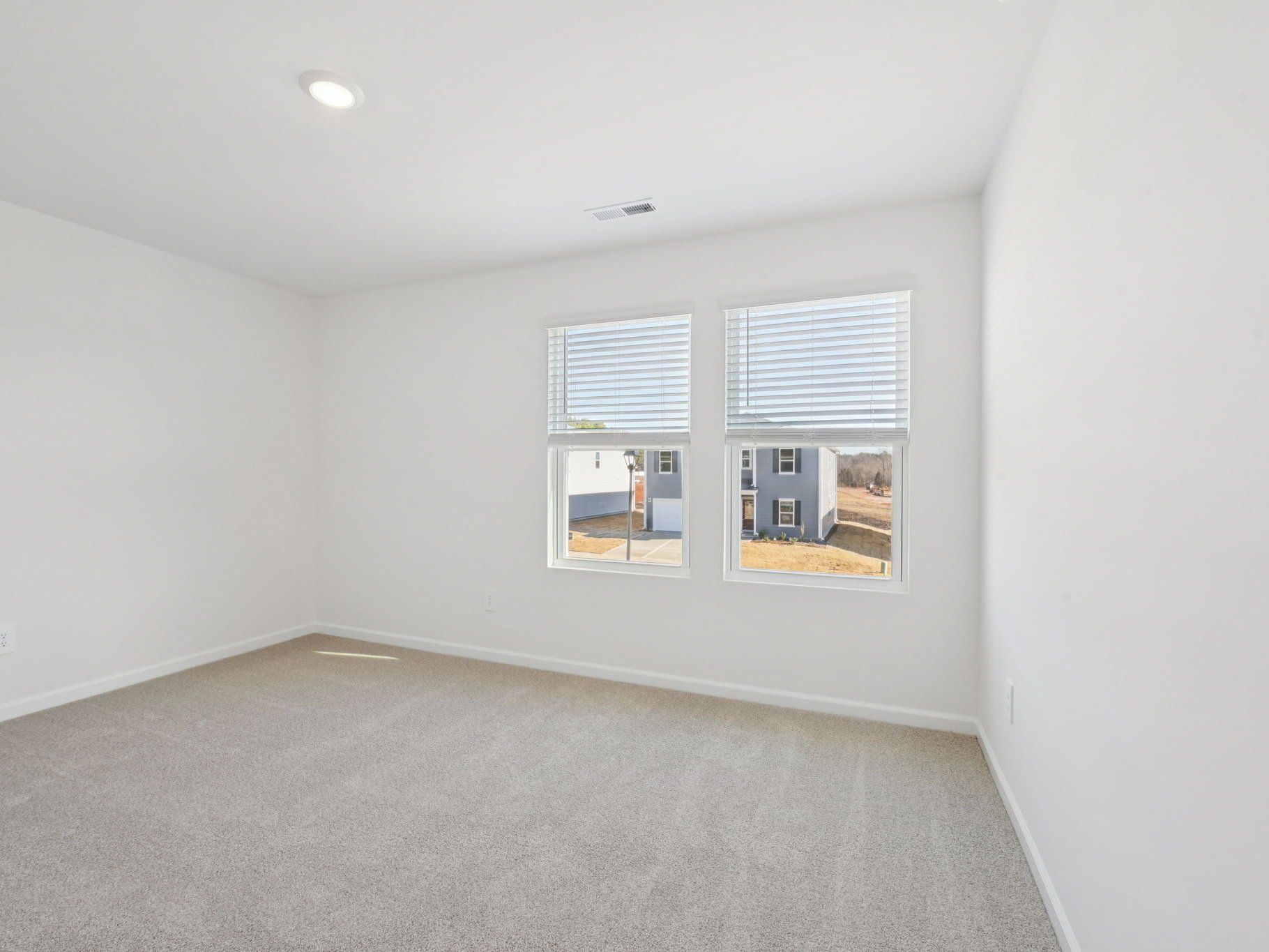 Secondary bedroom in the Sherwood floorplan at a Meritage Homes community in Raleigh, NC.