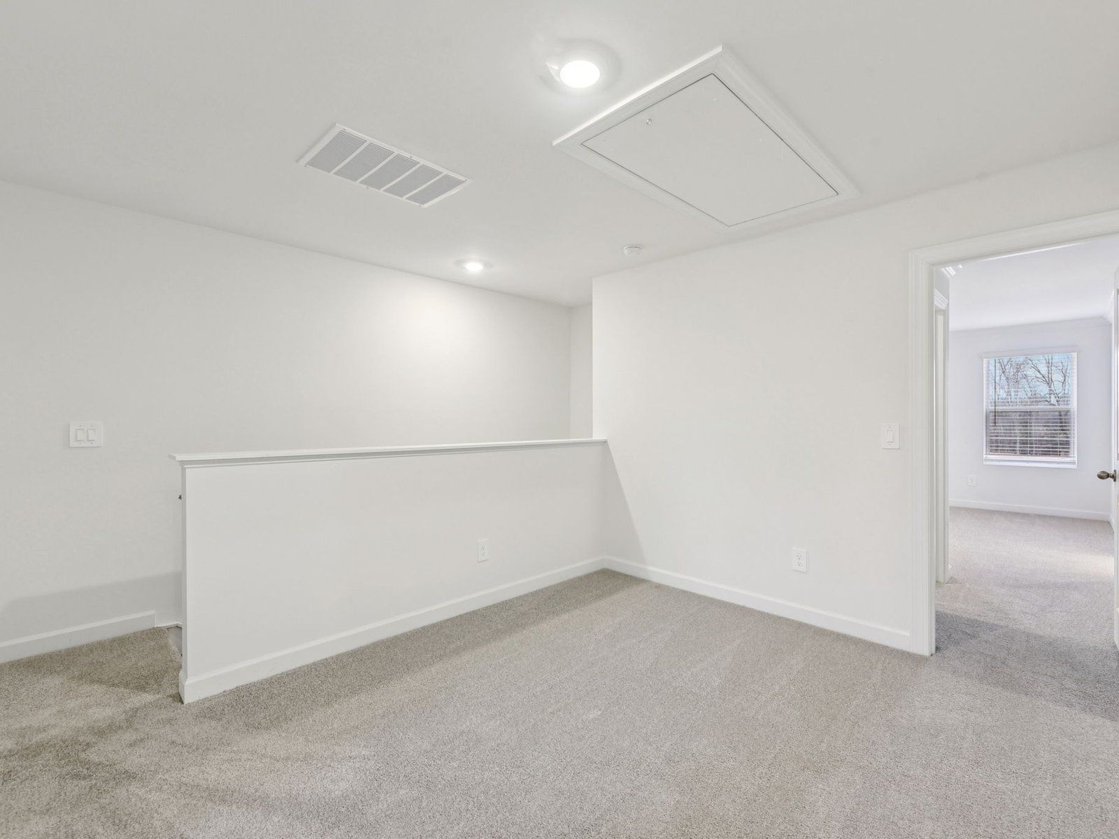 The upstairs loft conveniently leads to each bedroom.