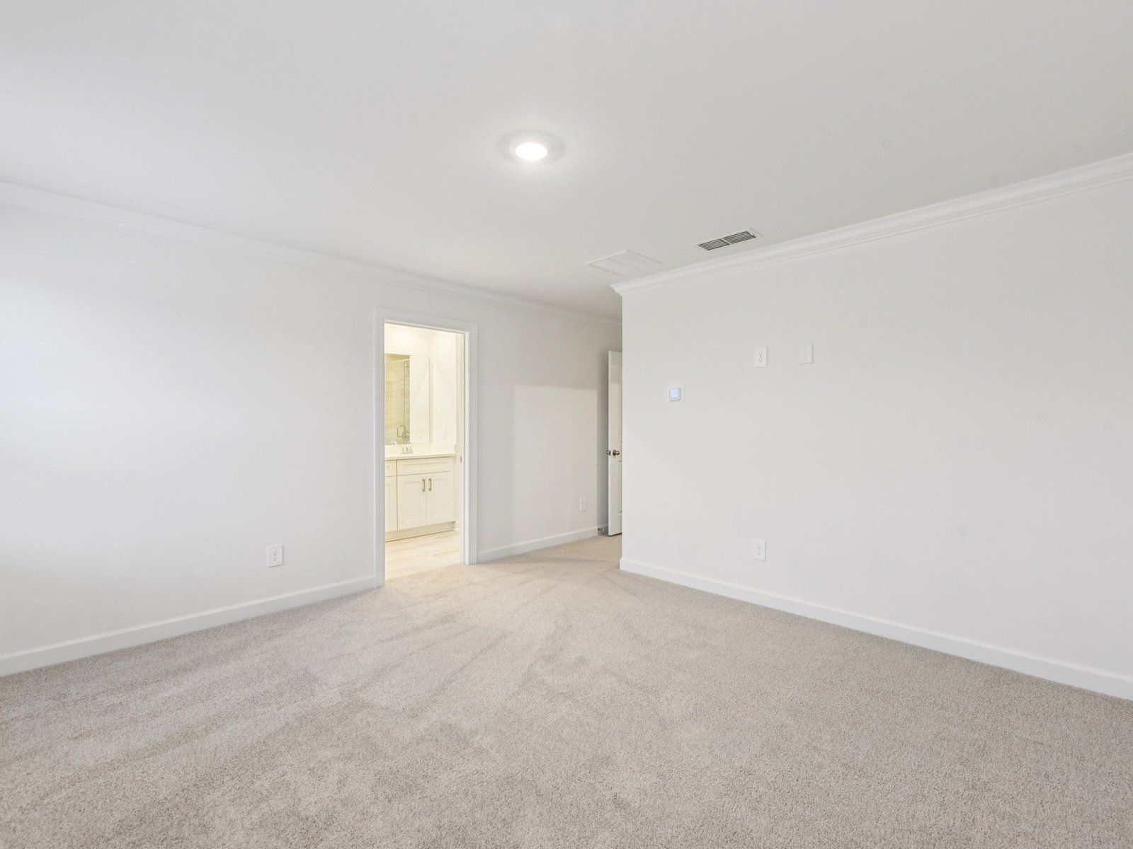 The primary bedroom leads to your own private ensuite.
