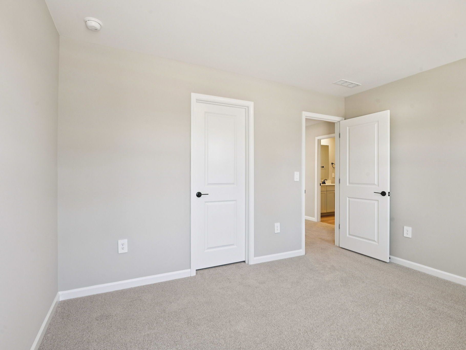Secondary bedroom in the Taylorsville floorplan at a Meritage Homes community in Raleigh, NC.