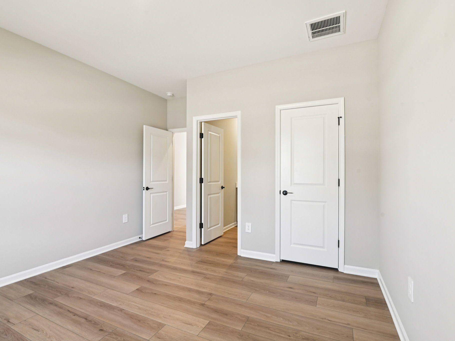 Secondary bedroom in the Taylorsville floorplan at a Meritage Homes community in Raleigh, NC.