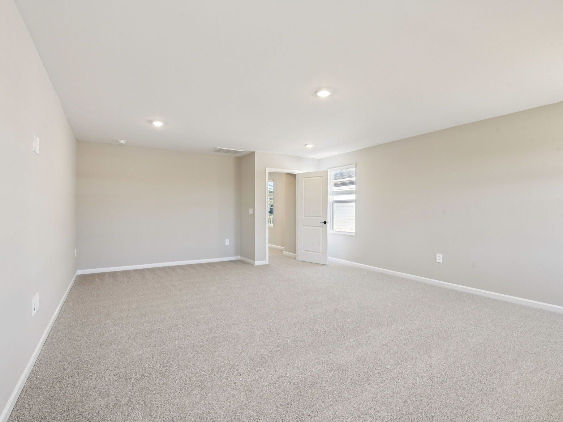 Primary bedroom in the Taylorsville floorplan at a Meritage Homes community in Raleigh, NC.
