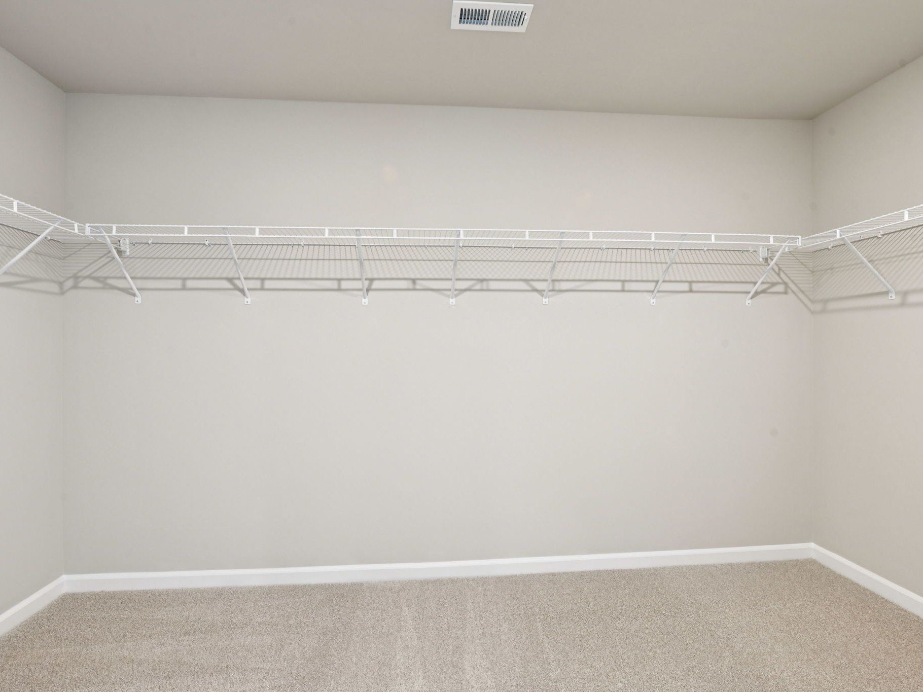 Walk-in closet in the Taylorsville floorplan at a Meritage Homes community in Raleigh, NC.