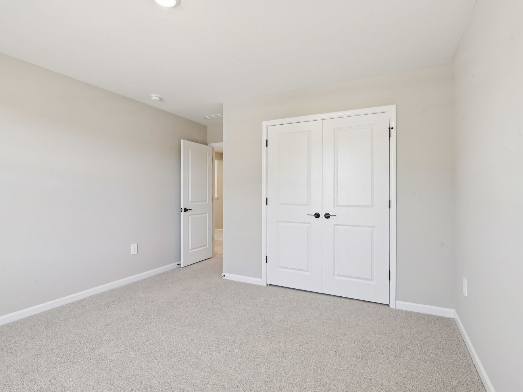 Secondary bedroom in the Taylorsville floorplan at a Meritage Homes community in Raleigh, NC.