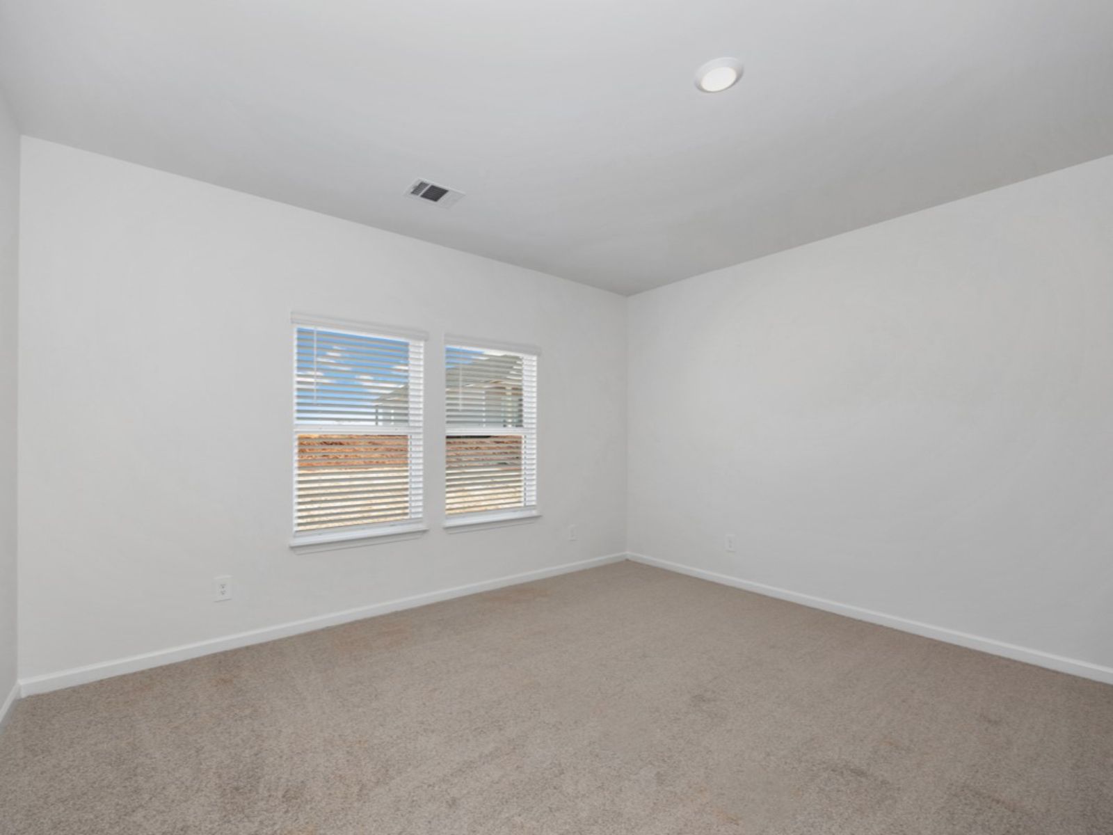 The Chandler floorplan with the Charm White interior package.