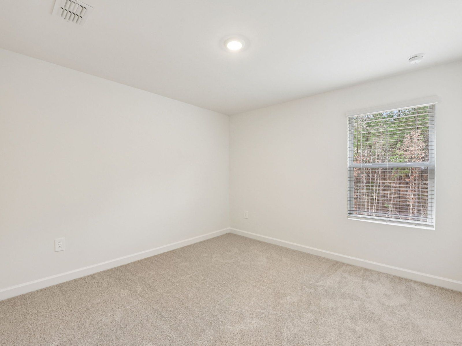 Turn a secondary bedroom into a private guest space for visitors.