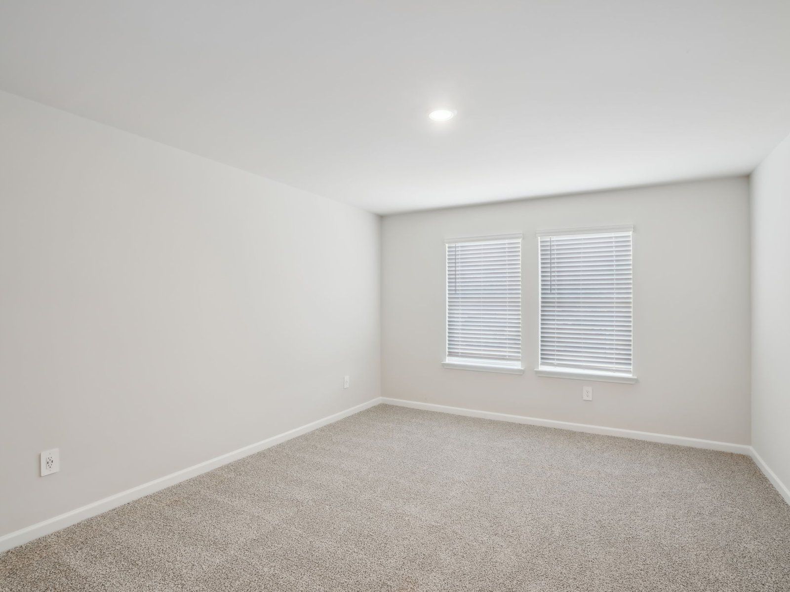 Primary bedroom in the Thompson floorplan at a Meritage Homes community in Atlanta, GA.