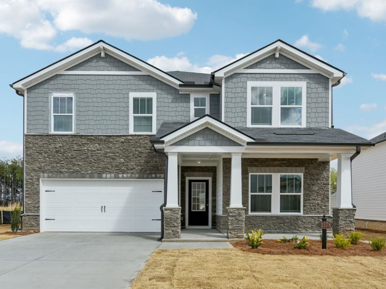 The Taylorsville floorplan with Elevation K modeled at Parkside at Grayson.