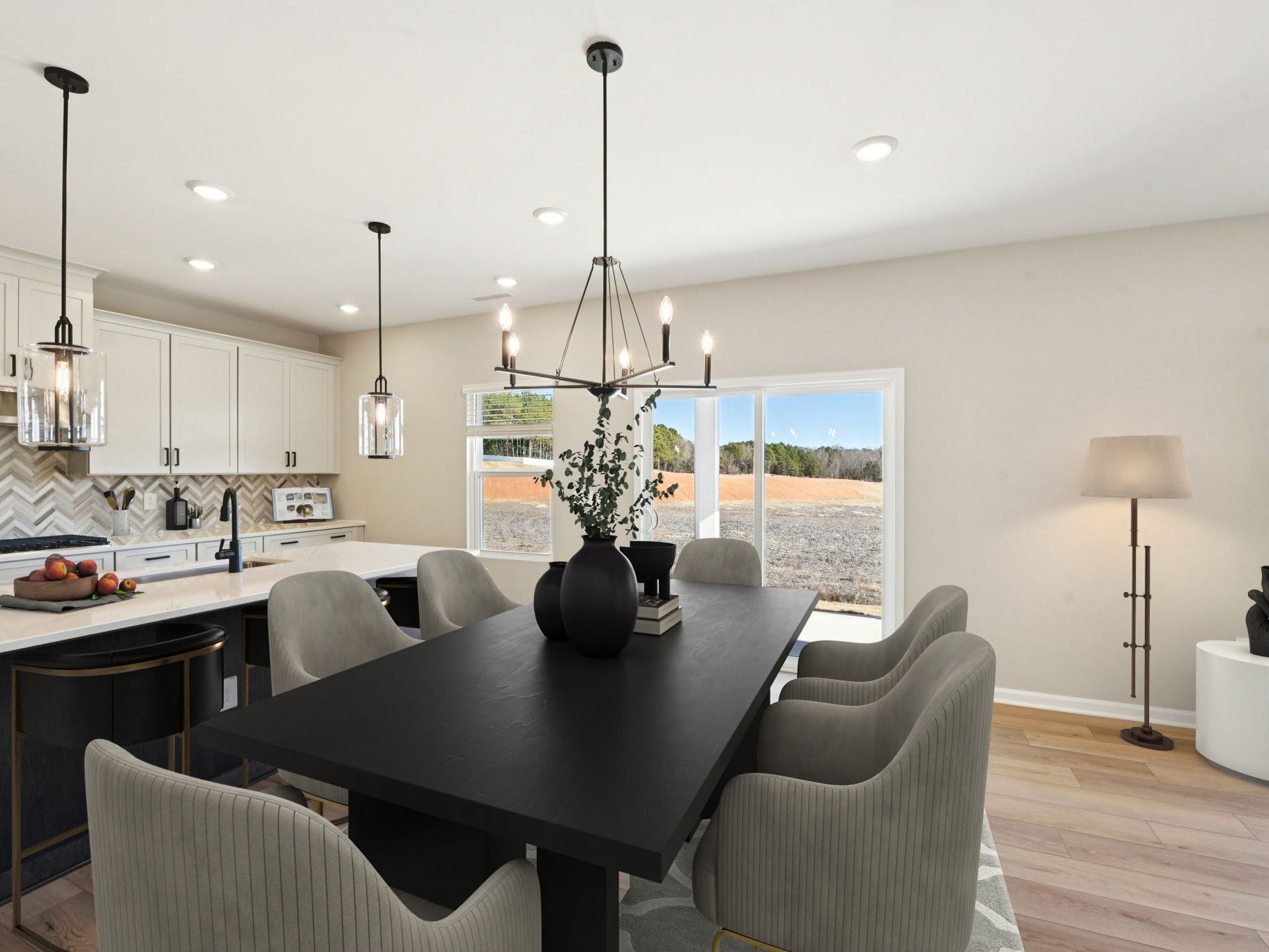 Dining area in the Taylorsville floorplan at a Meritage Homes community in Raleigh, NC.