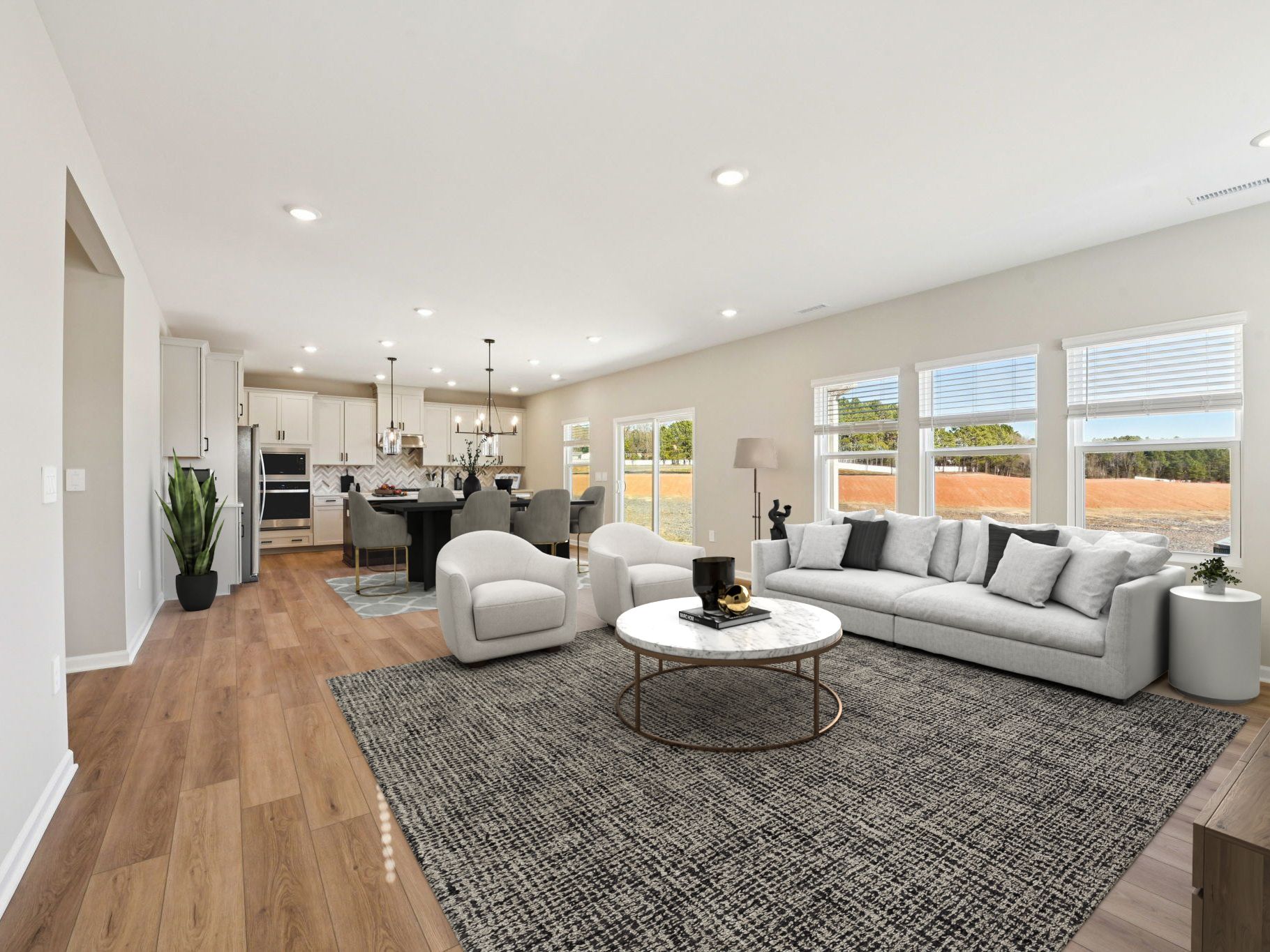 Great room in the Taylorsville floorplan at a Meritage Homes community in Raleigh, NC.