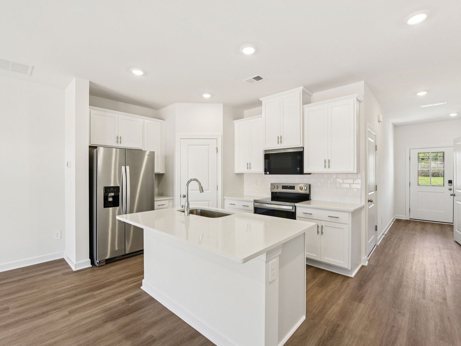 Cook your favorite meals in the sleek, modern kitchen.