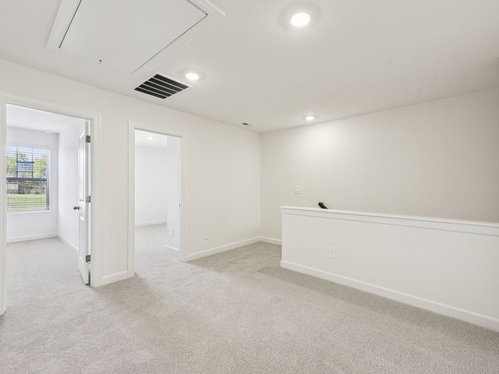 The upstairs loft conveniently leads to each bedroom.
