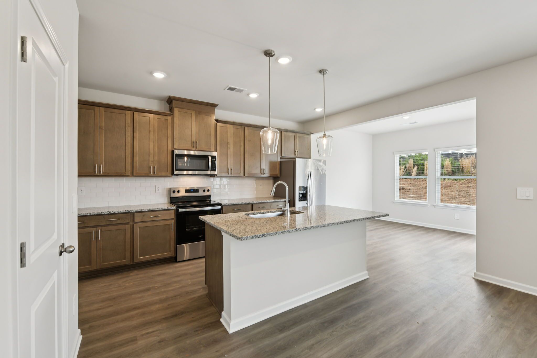 The Dallas floorplan with the Cozy Almond interior package modeled at Hawthorne Station.