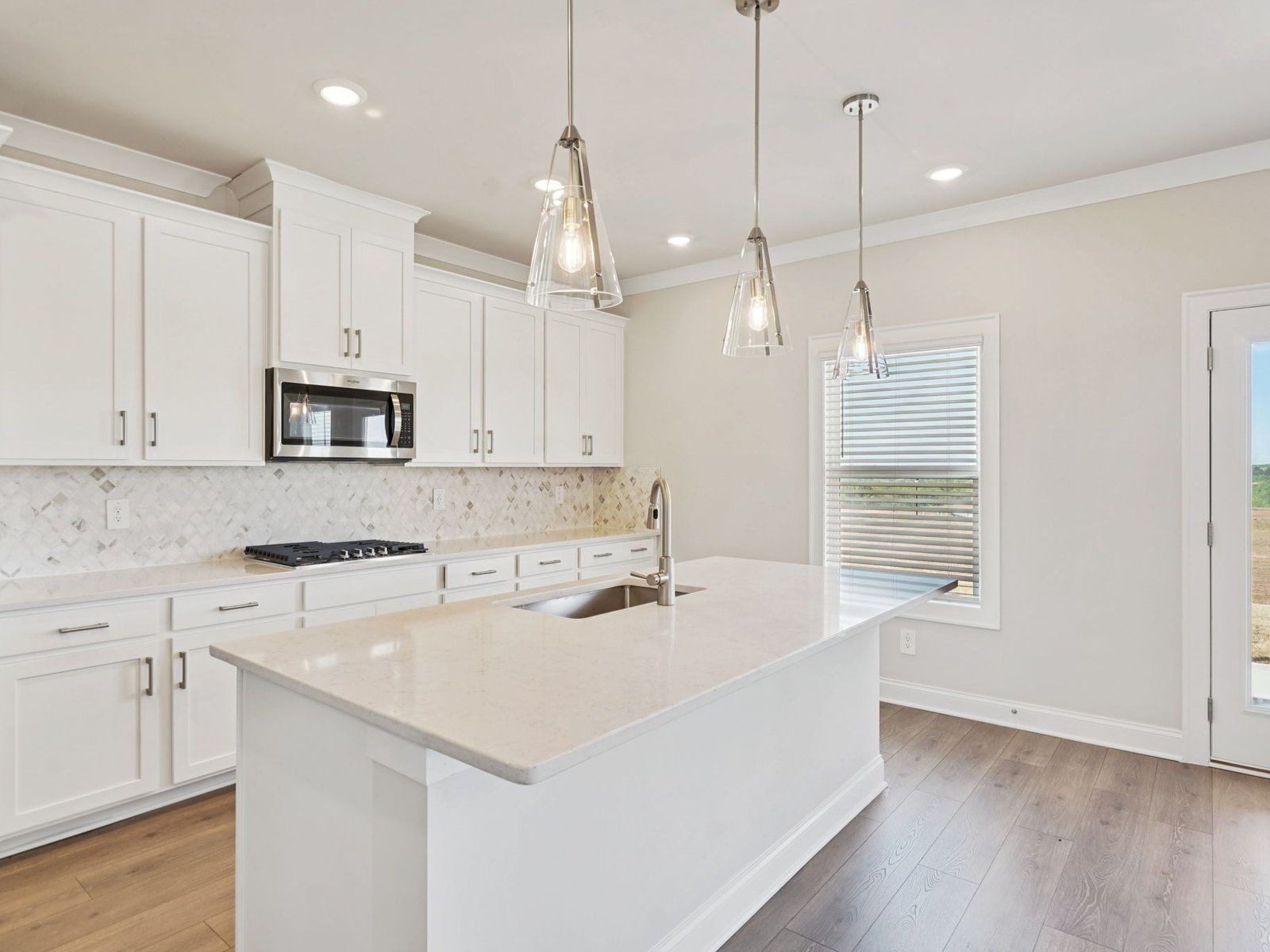 The Taylorsville floorplan with the Elegant Minimalism Linen interior package modeled at River Pointe.