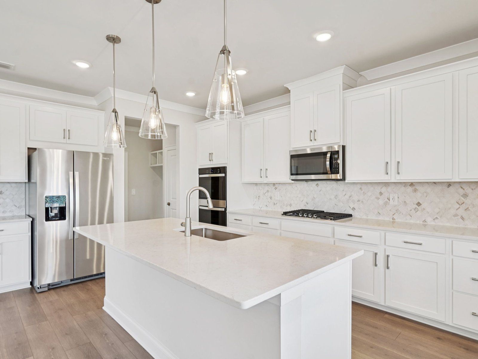 The Taylorsville floorplan with the Elegant Minimalism Linen interior package modeled at River Pointe.