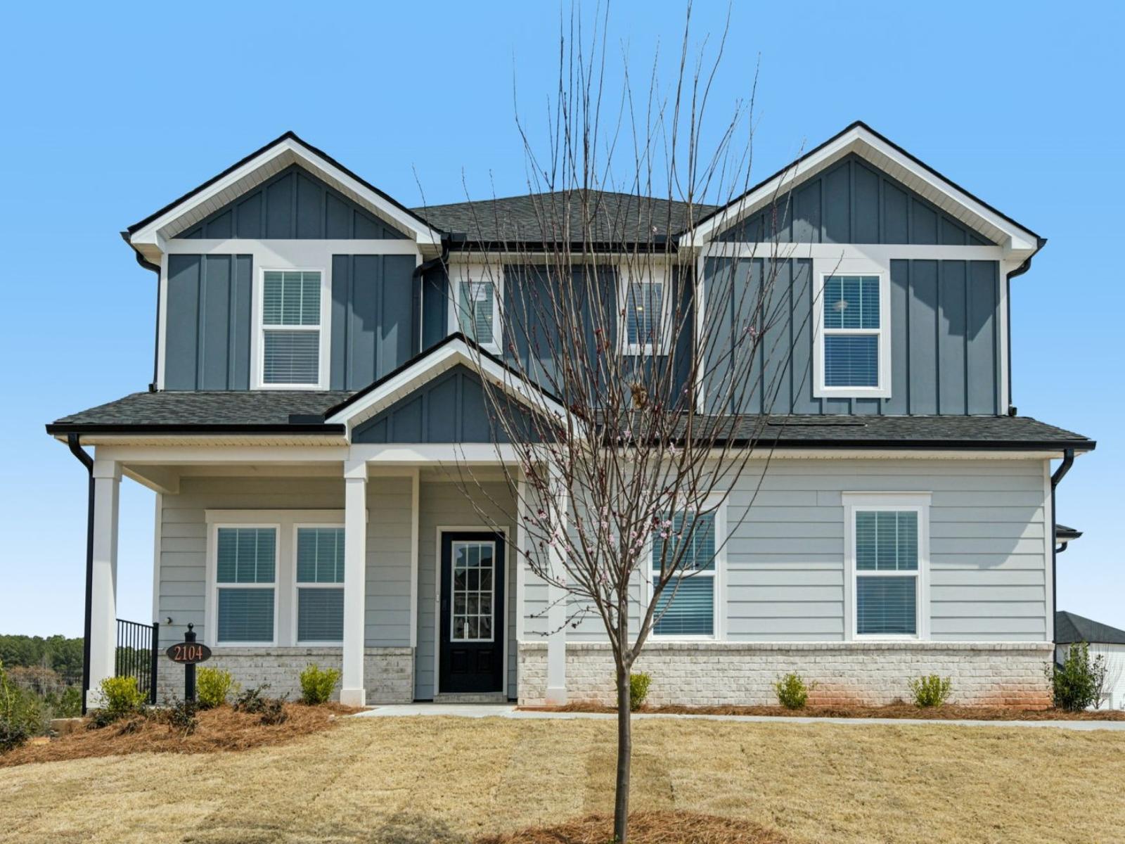 The Johnson floorplan with Elevation F modeled at River Pointe.