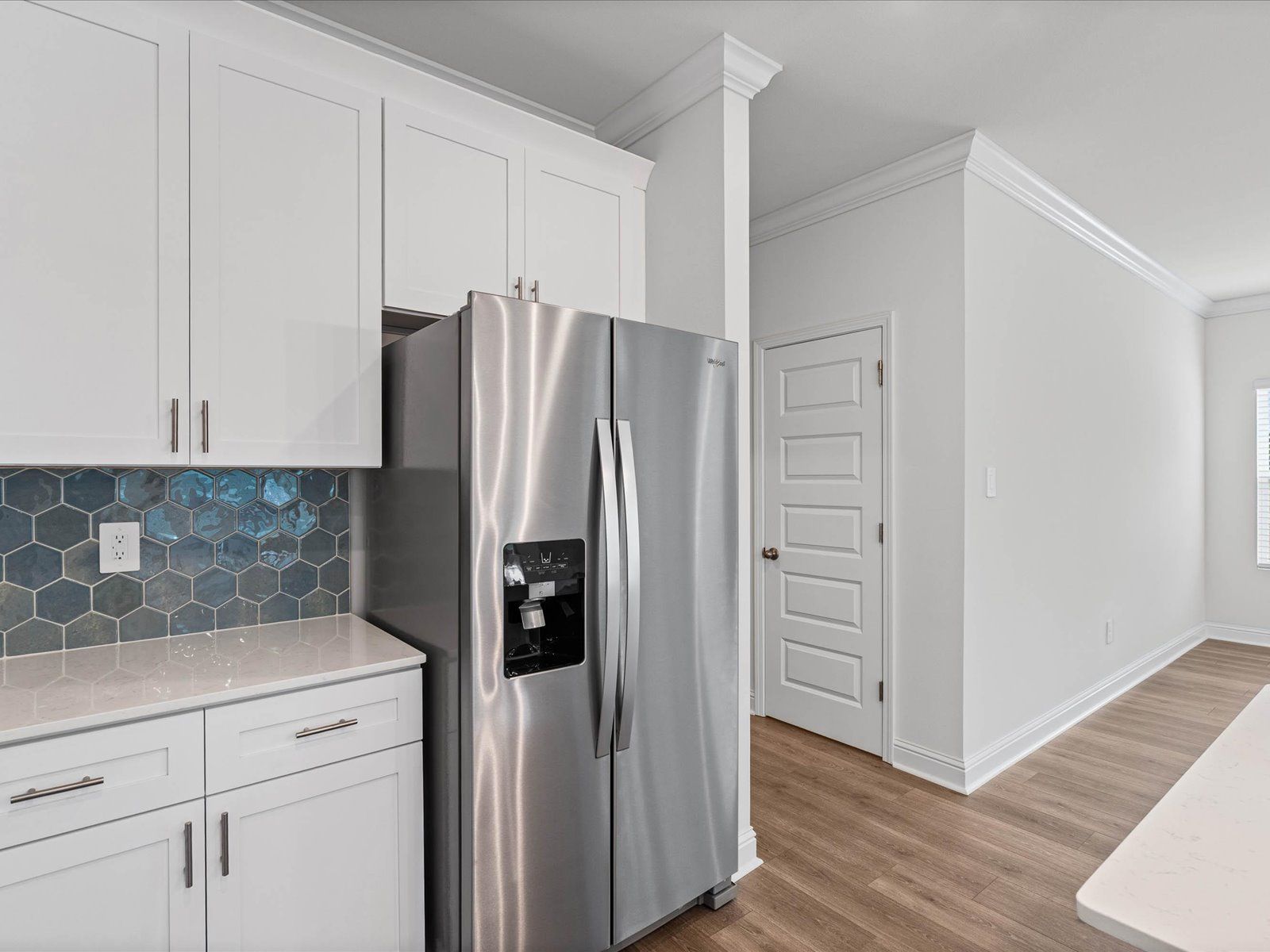 Kitchen in the Carolina floorplan at a Meritage Homes community in Ocean Springs, MS.