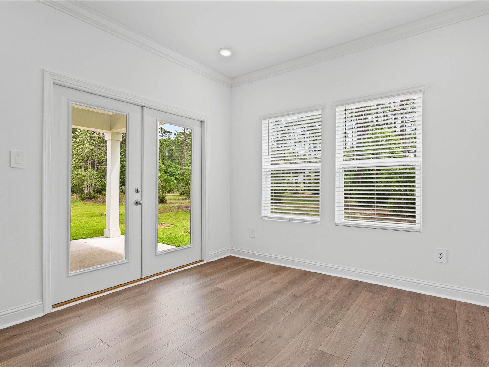 Dining area in the Carolina floorplan at a Meritage Homes community in Ocean Springs, MS.