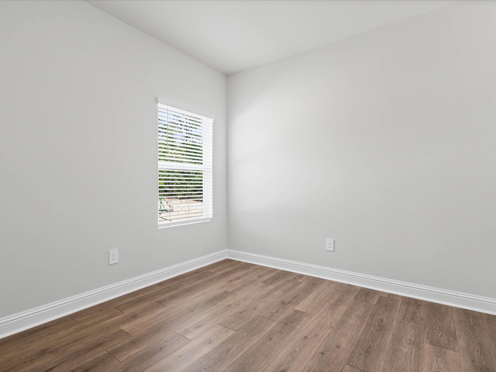 Secondary bedroom in the Carolina floorplan at a Meritage Homes community in Ocean Springs, MS.