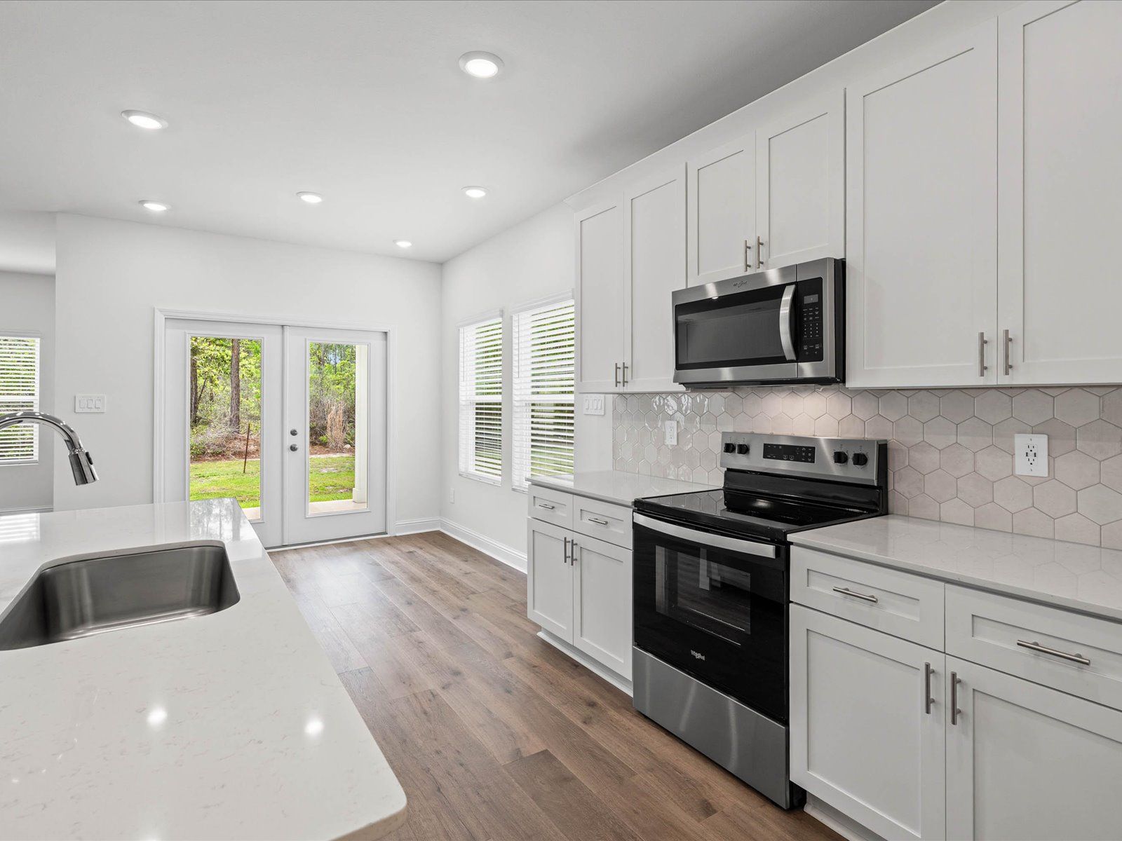 Kitchen in the Newport floorplan at a Meritage Homes community in Ocean Springs, MS.