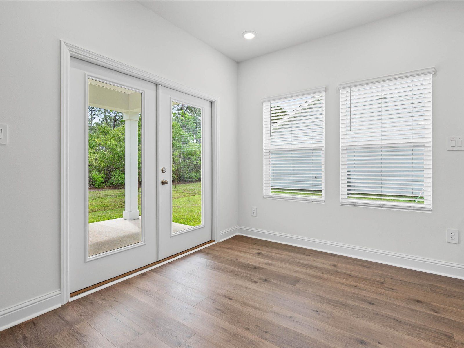 Dining area in the Newport floorplan at a Meritage Homes community in Ocean Springs, MS.