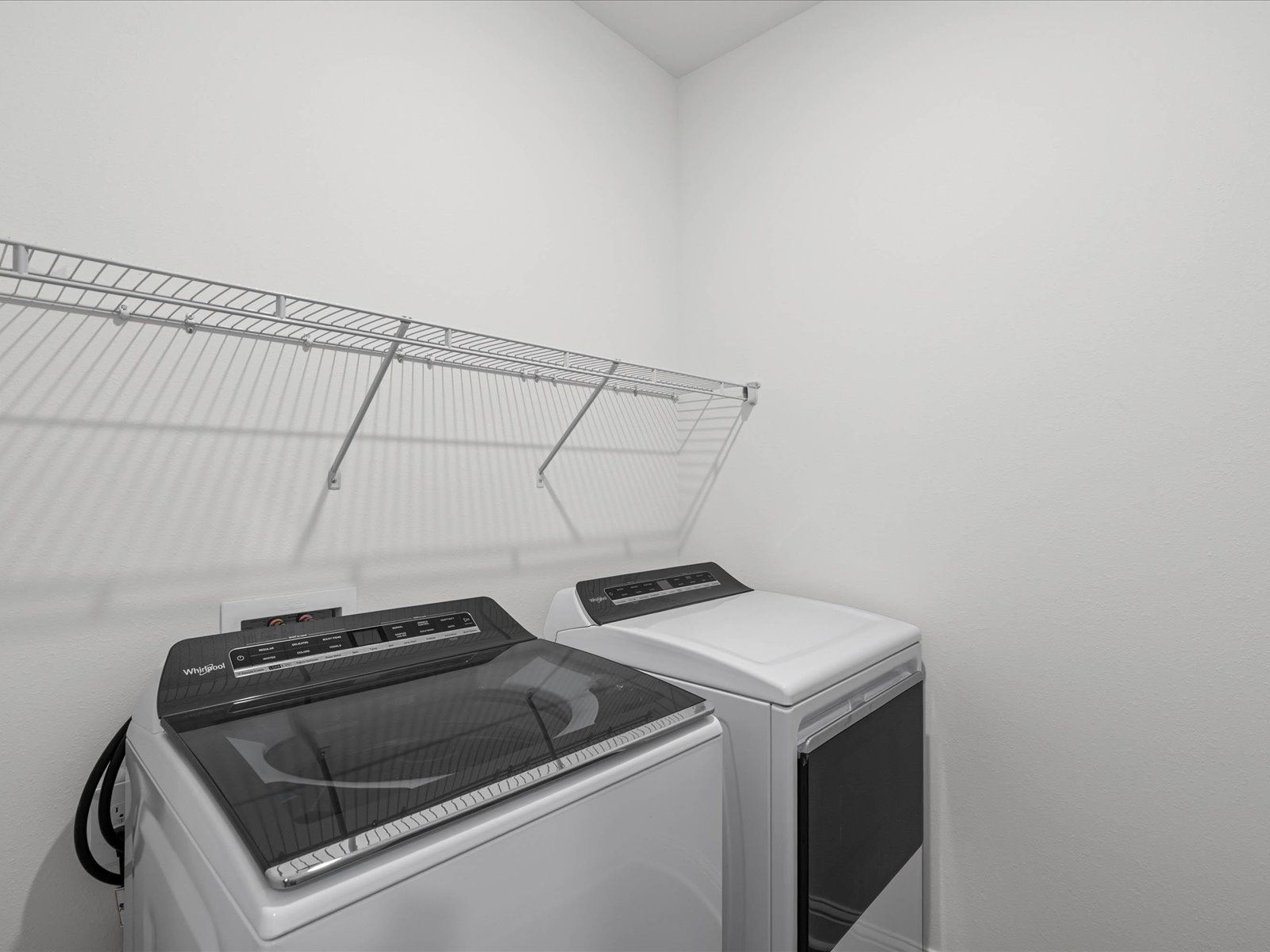Laundry room in the Newport floorplan at a Meritage Homes community in Ocean Springs, MS.