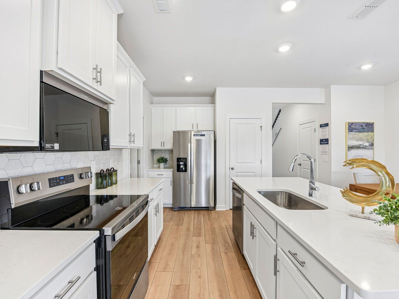 The functional kitchen layout makes meal-prep much easier.