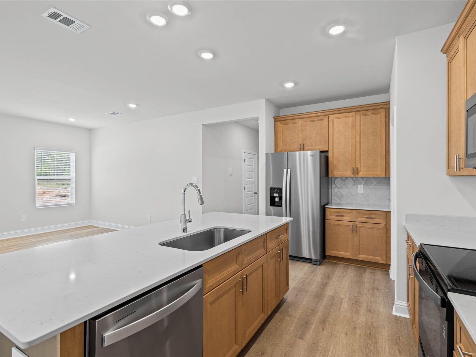 Kitchen in the Chandler floorplan at a Meritage Homes community in Ocean Springs, MS.