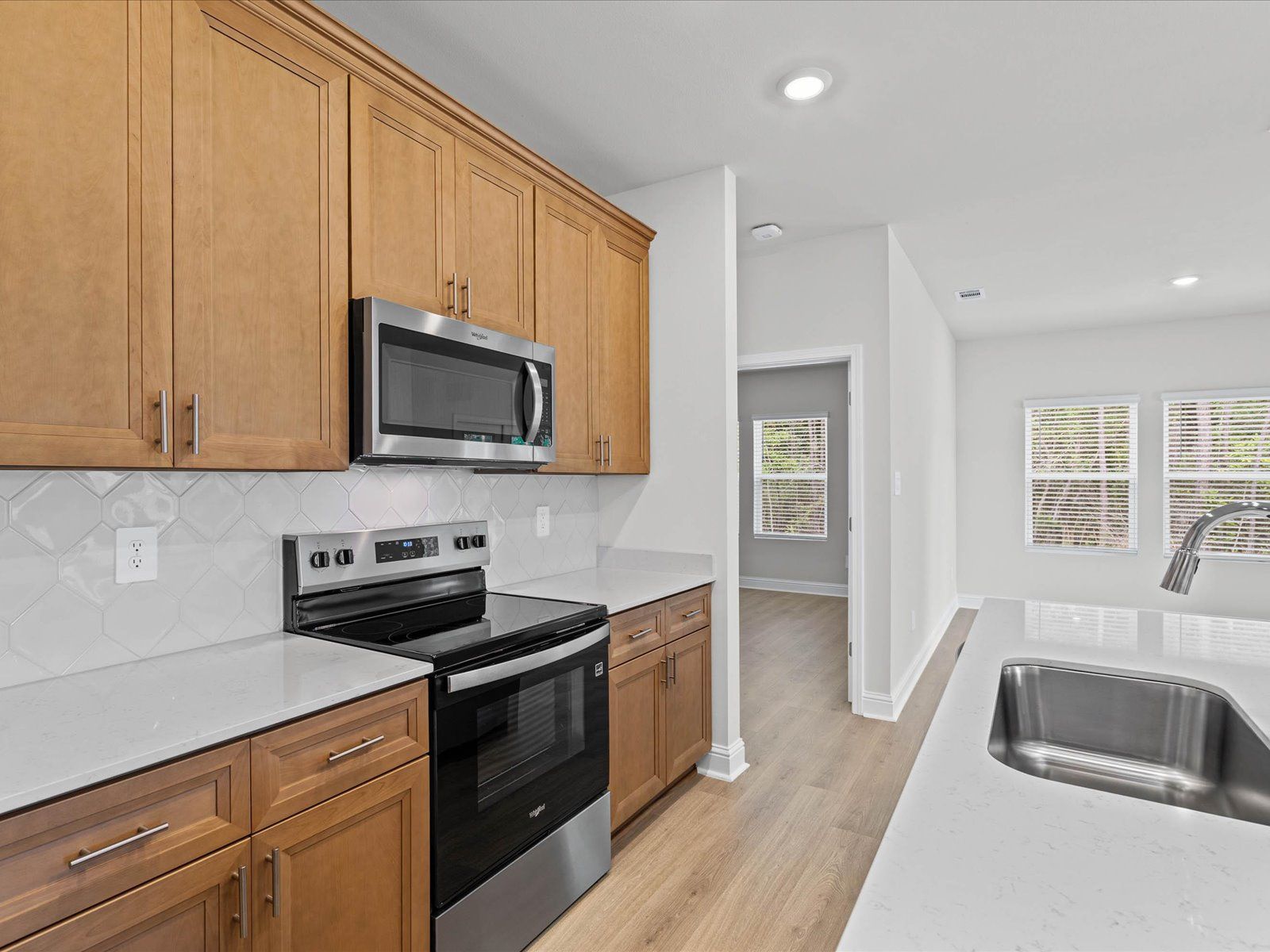 Kitchen in the Chandler floorplan at a Meritage Homes community in Ocean Springs, MS.