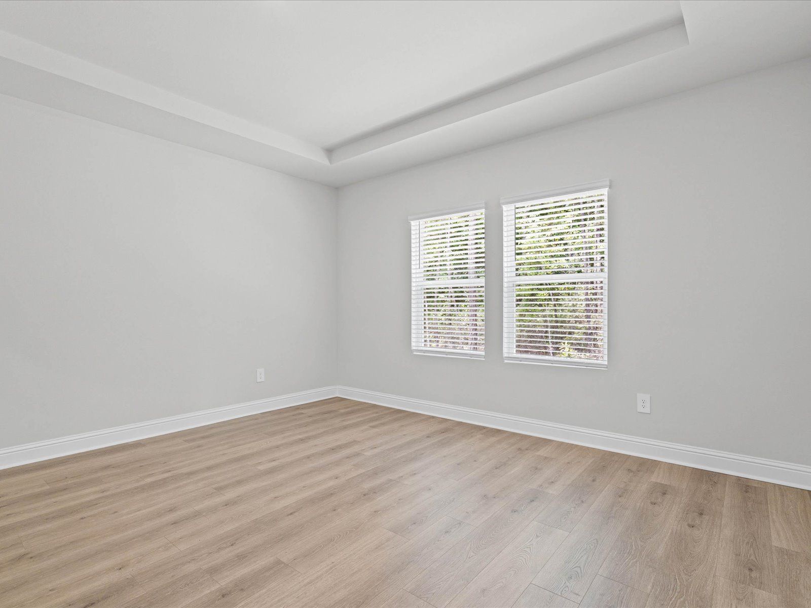 Primary bedroom in the Chandler floorplan at a Meritage Homes community in Ocean Springs, MS.