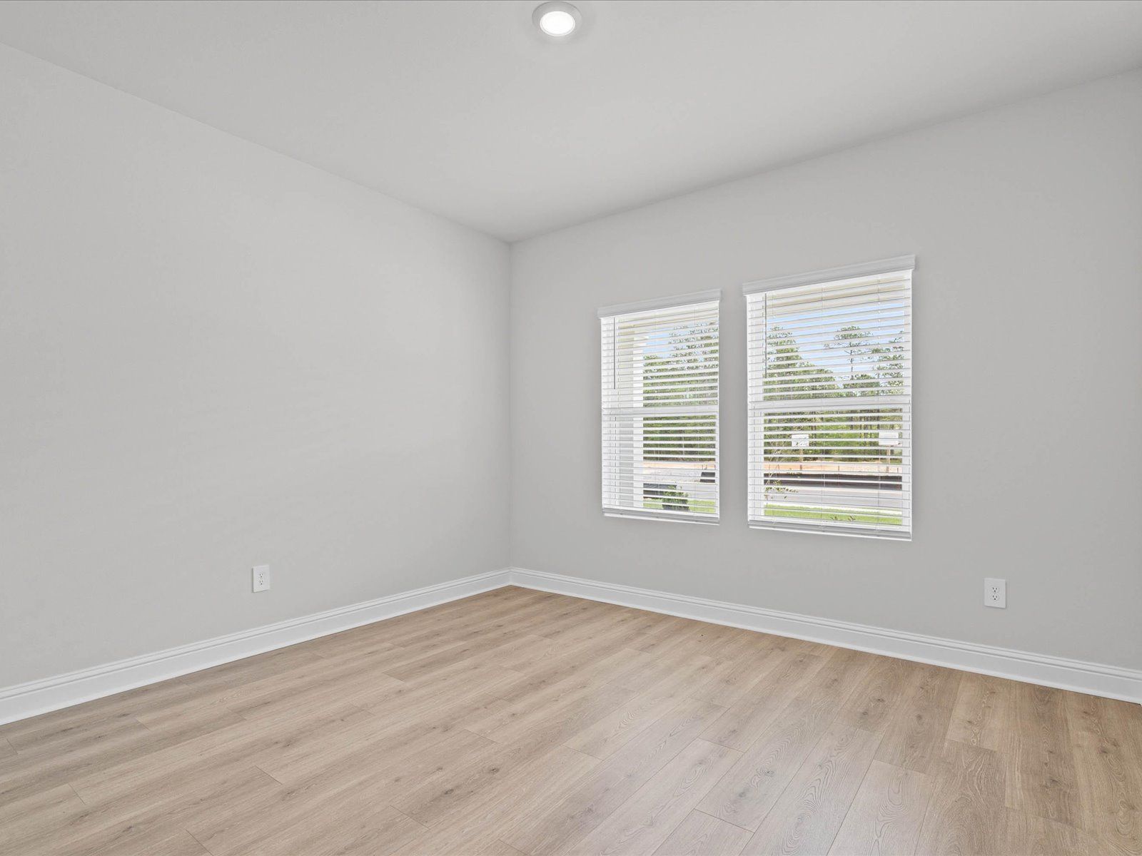 Secondary bedroom in the Chandler floorplan at a Meritage Homes community in Ocean Springs, MS.