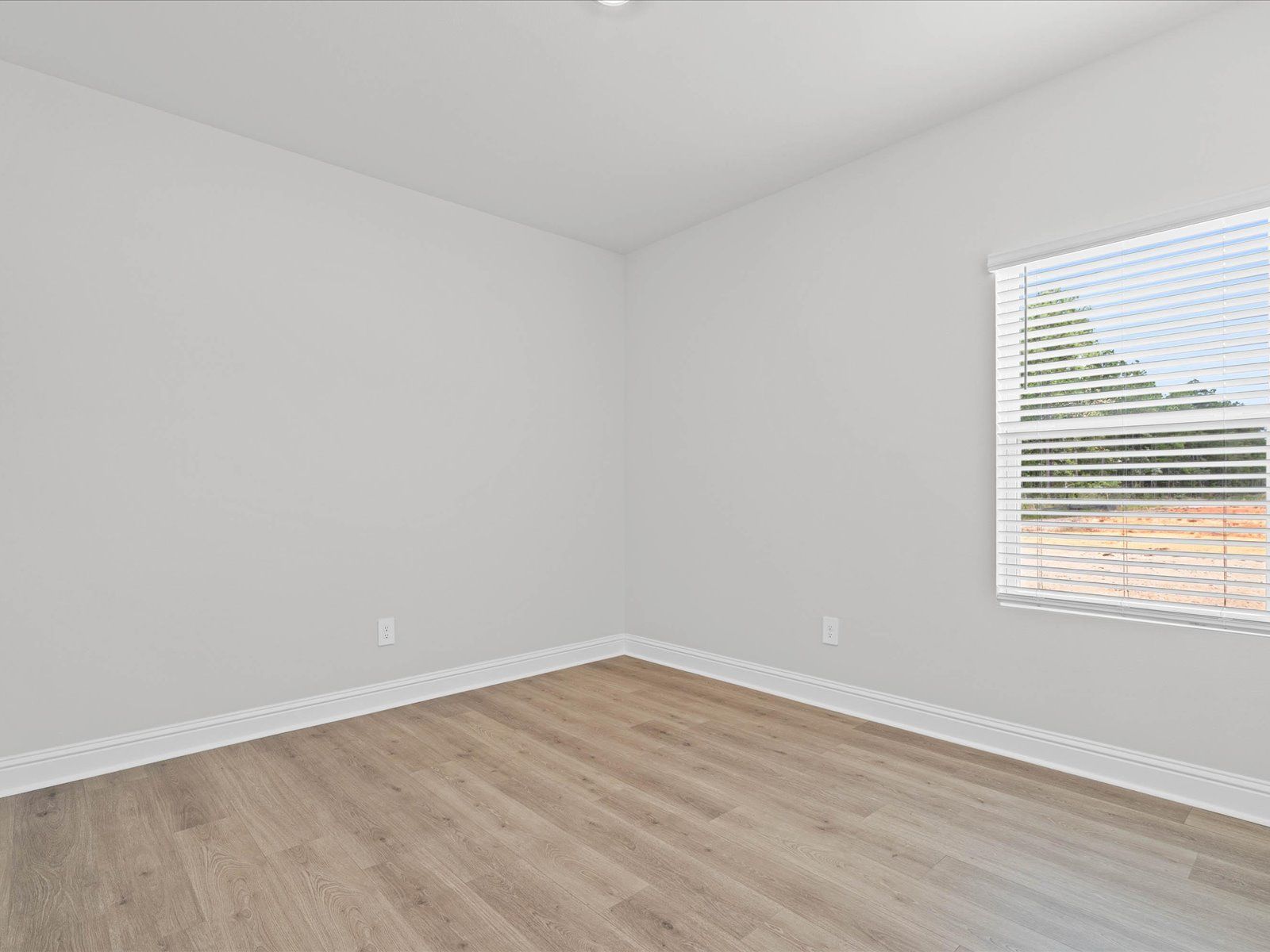 Secondary bedroom in the Chandler floorplan at a Meritage Homes community in Ocean Springs, MS.