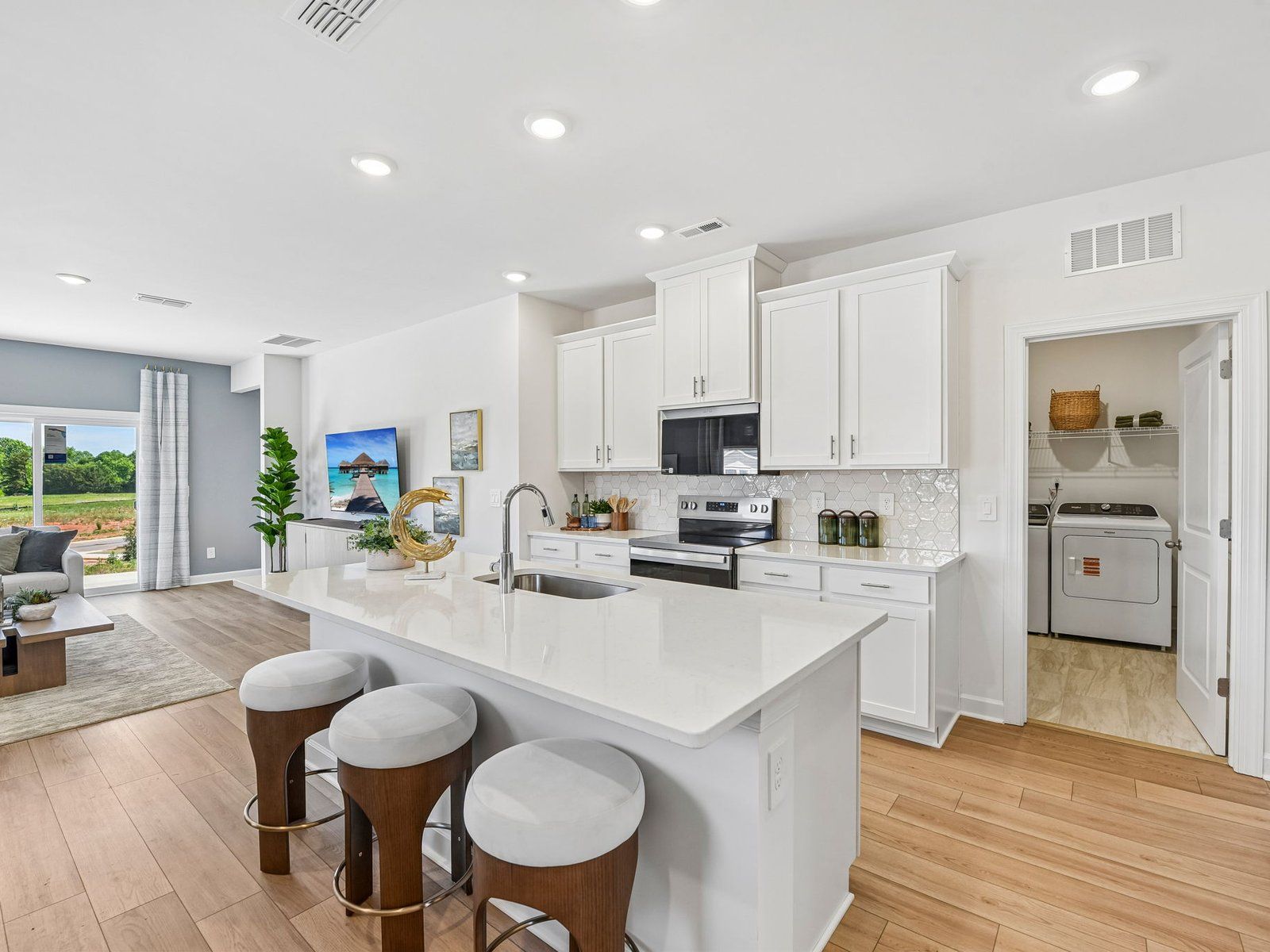 Cook your favorite meals in the sleek, modern kitchen.