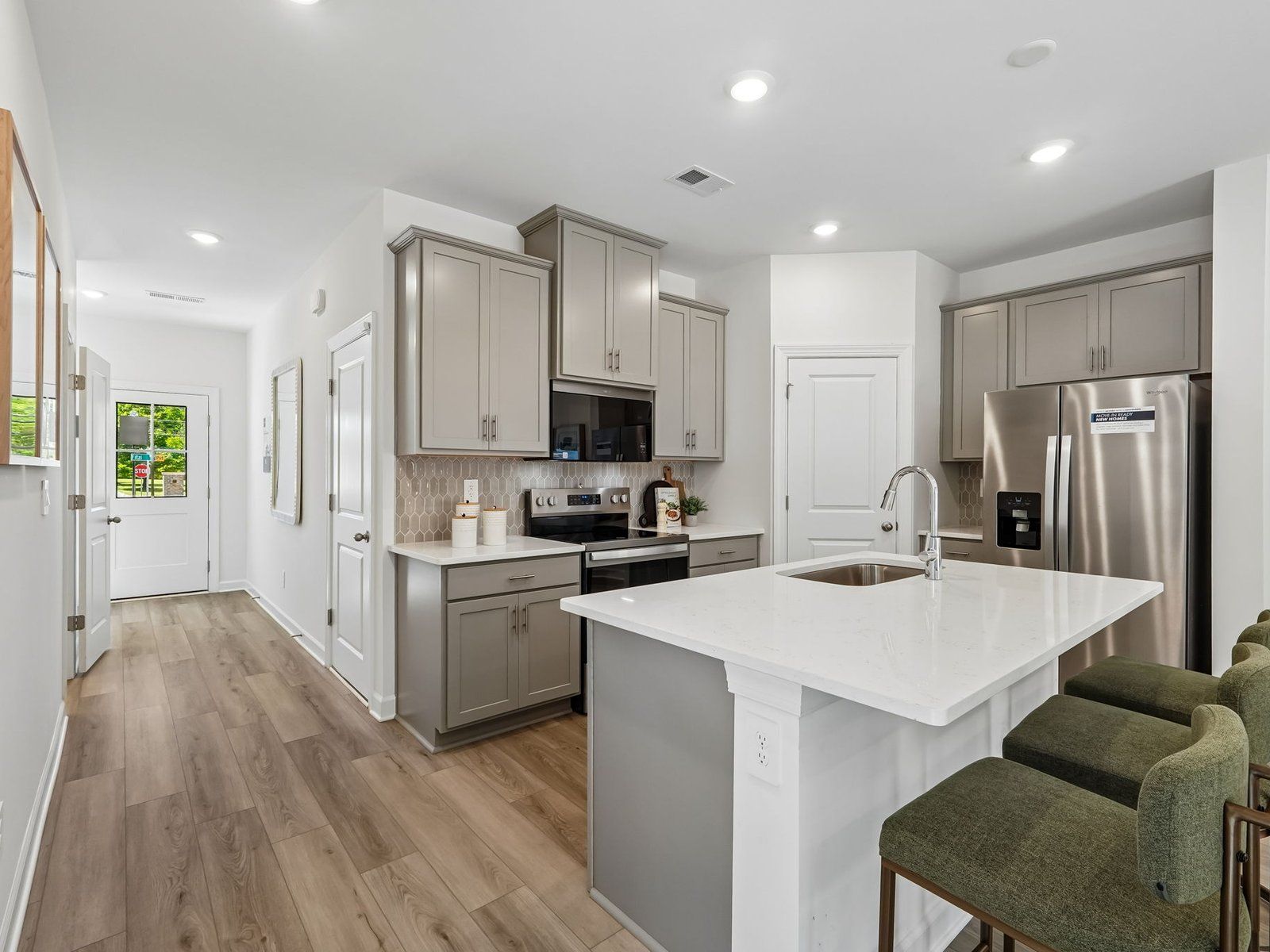Cook your favorite meals in the sleek, modern kitchen.