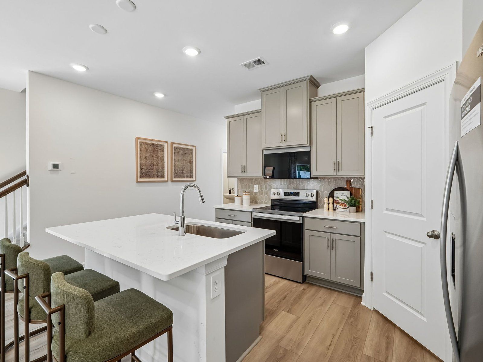 Turn the oversized kitchen island into a bar counter for additional seating.