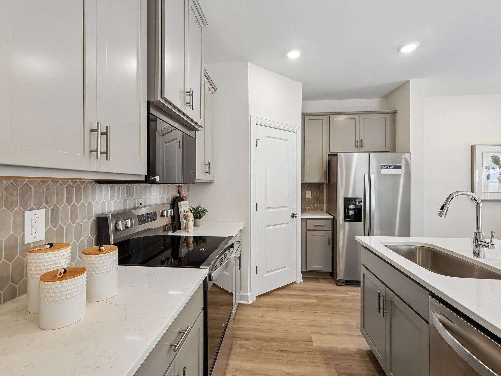 The functional kitchen layout makes meal-prep much easier.