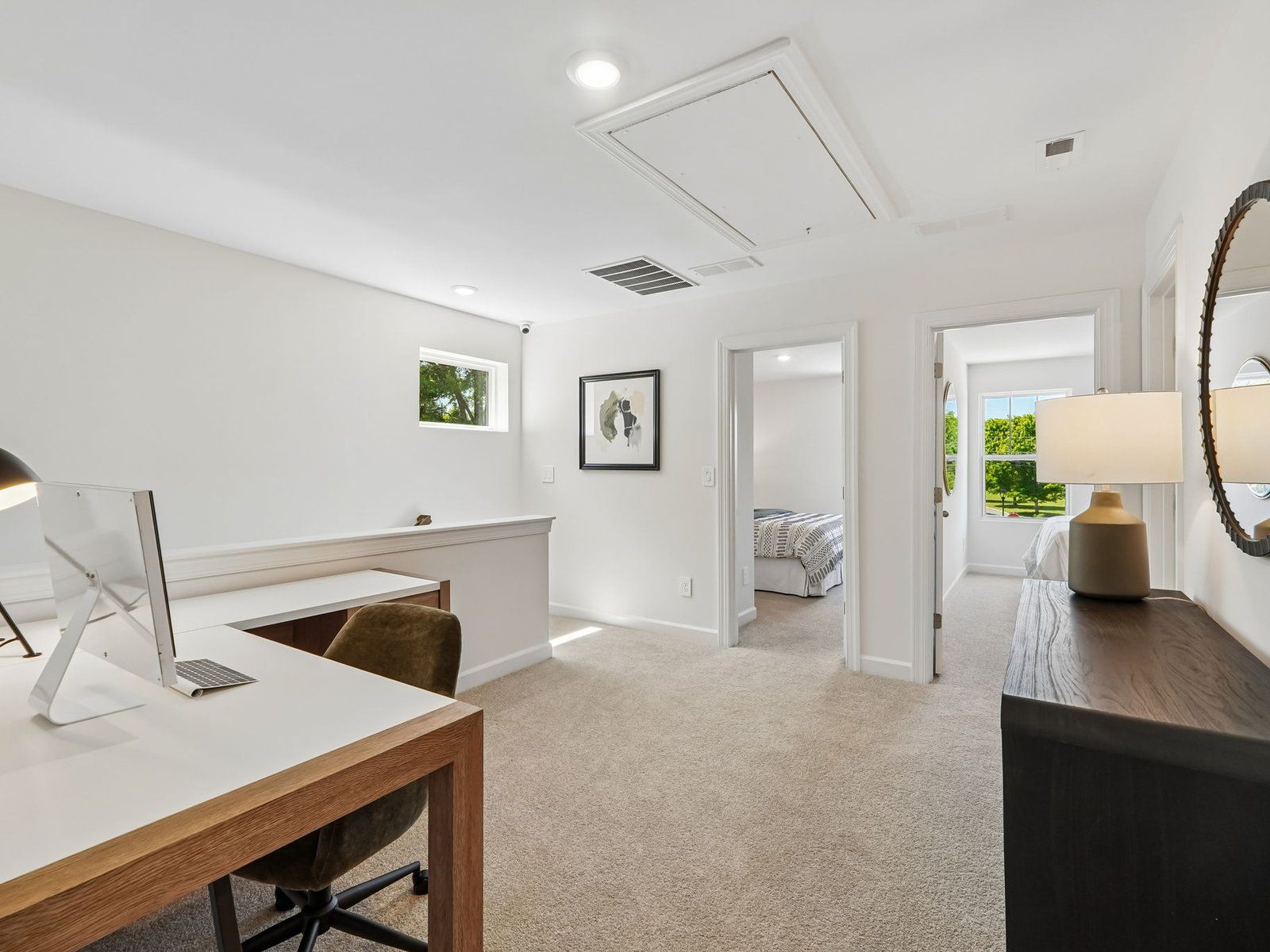 The upstairs loft conveniently leads to each bedroom.