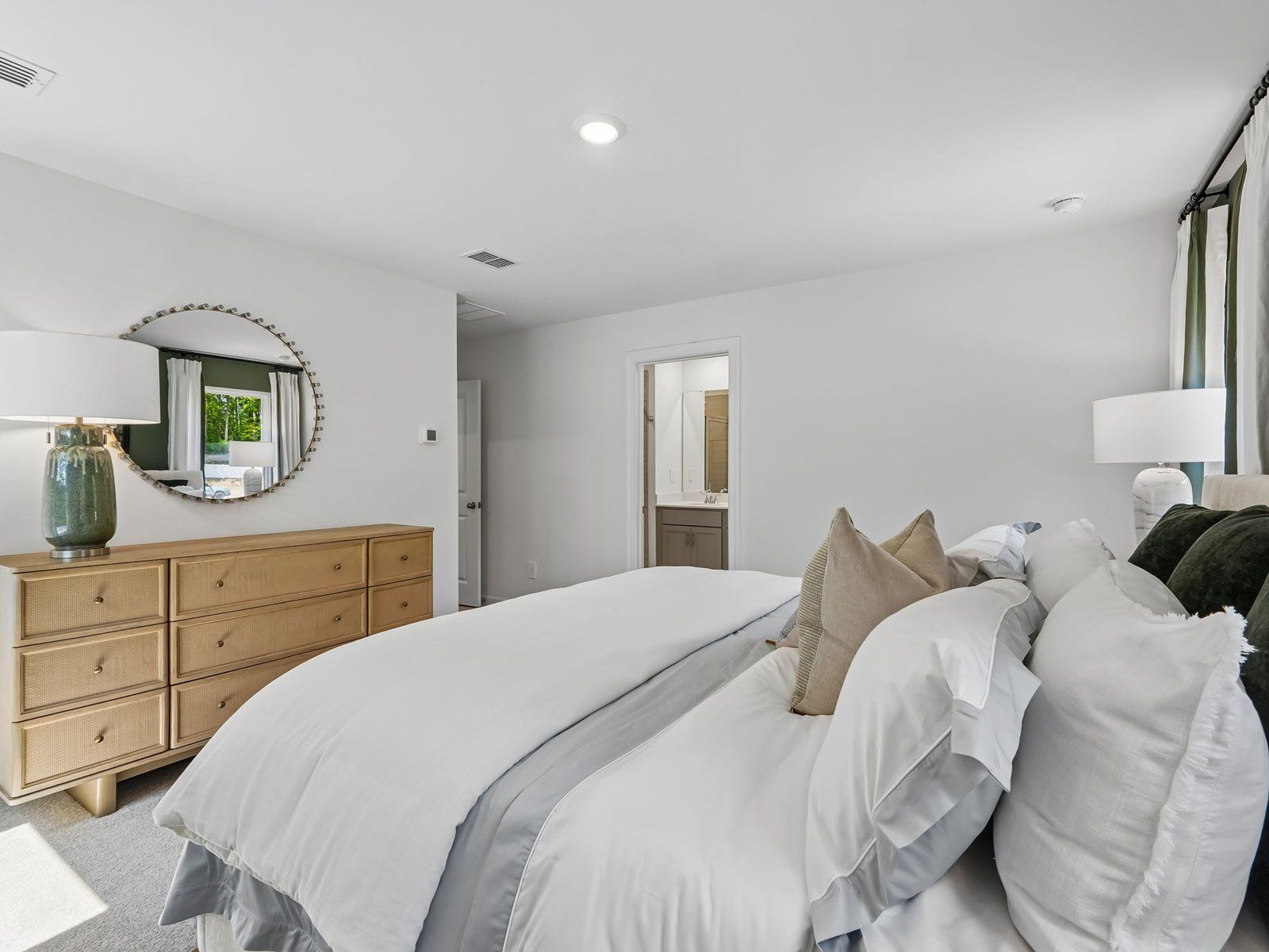 The primary bedroom connects to your own personal ensuite.