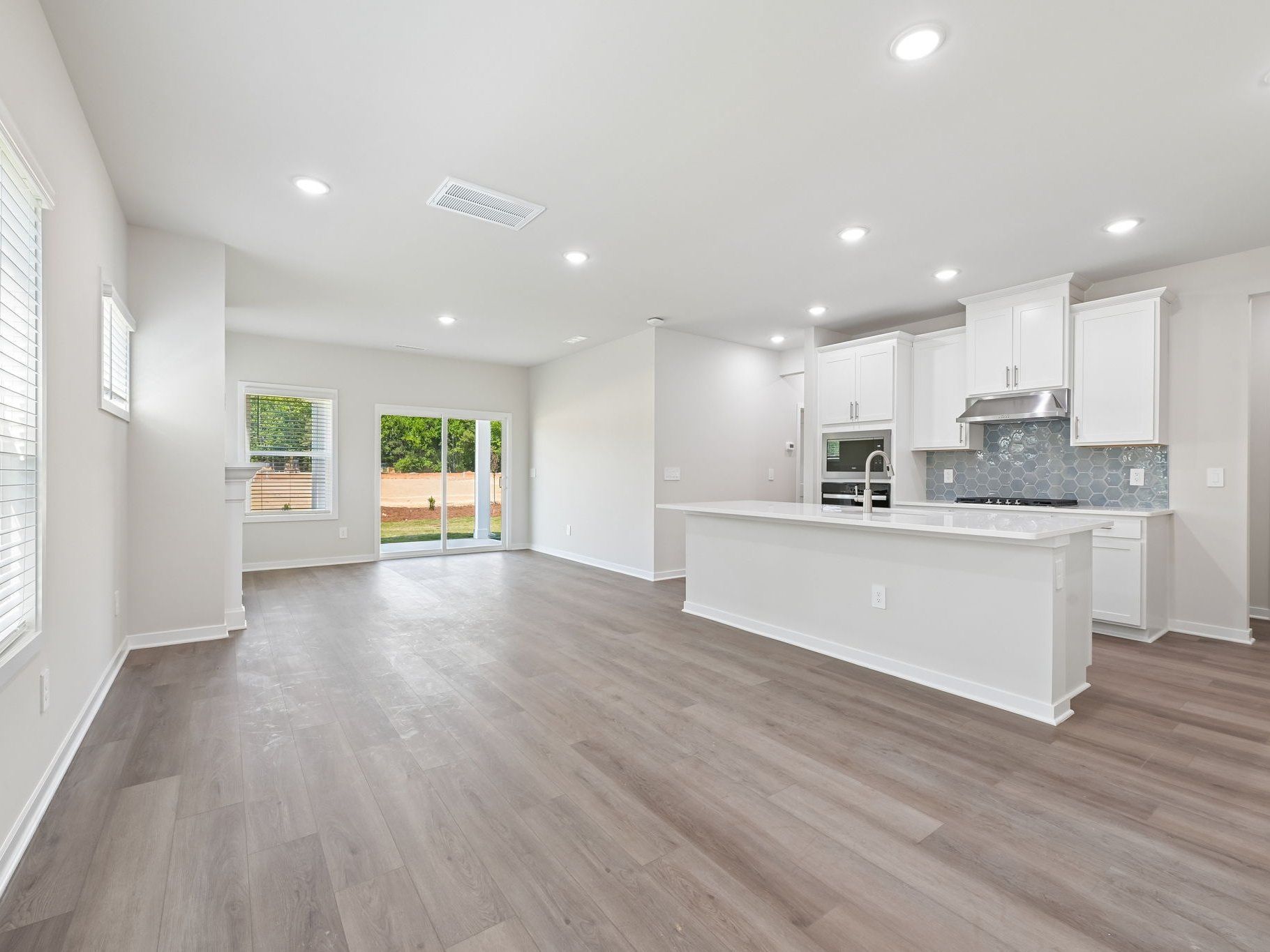 Dining area in the Roswell floorplan at a Meritage Homes community in Wendell, NC.