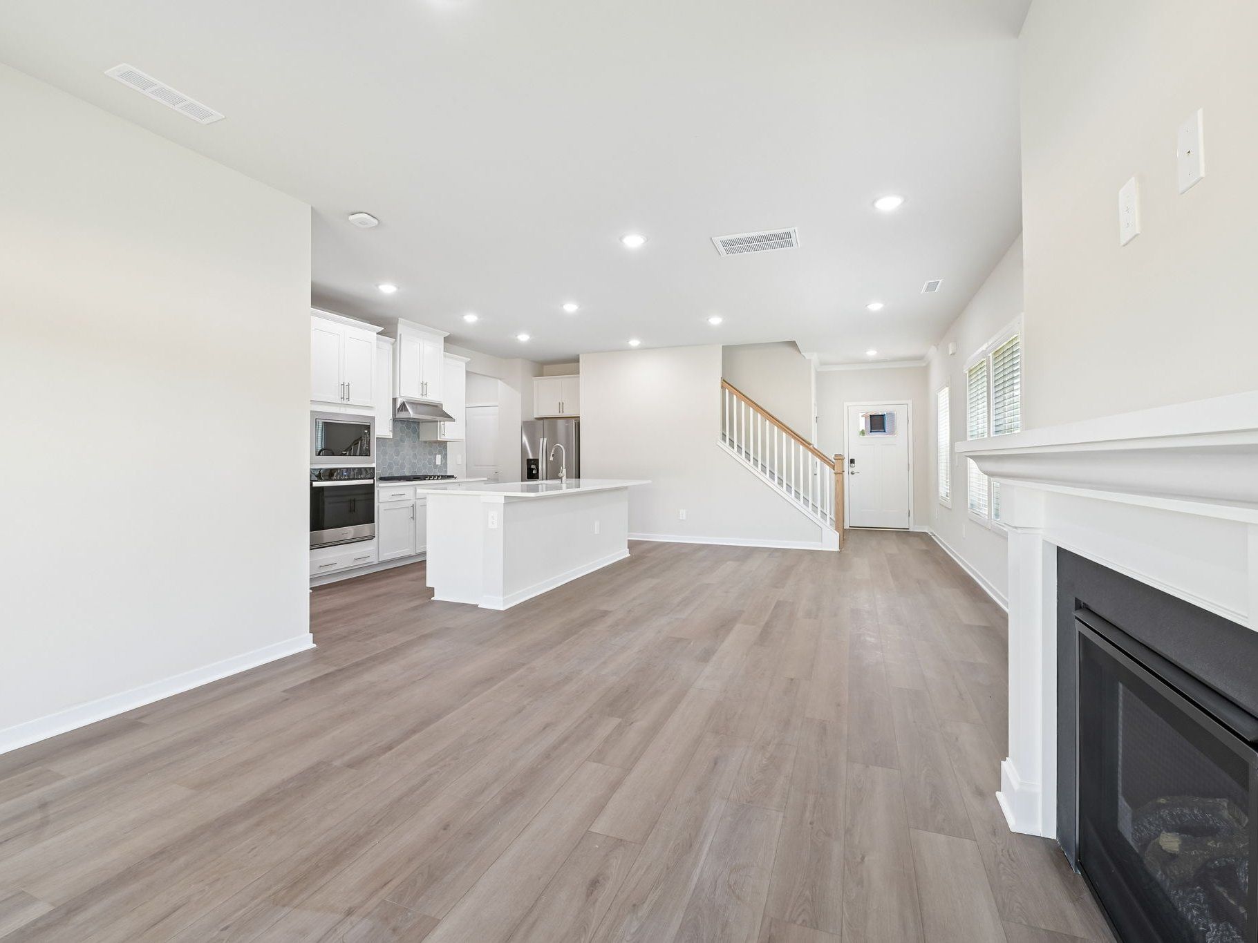 Great room in the Roswell floorplan at a Meritage Homes community in Wendell, NC.