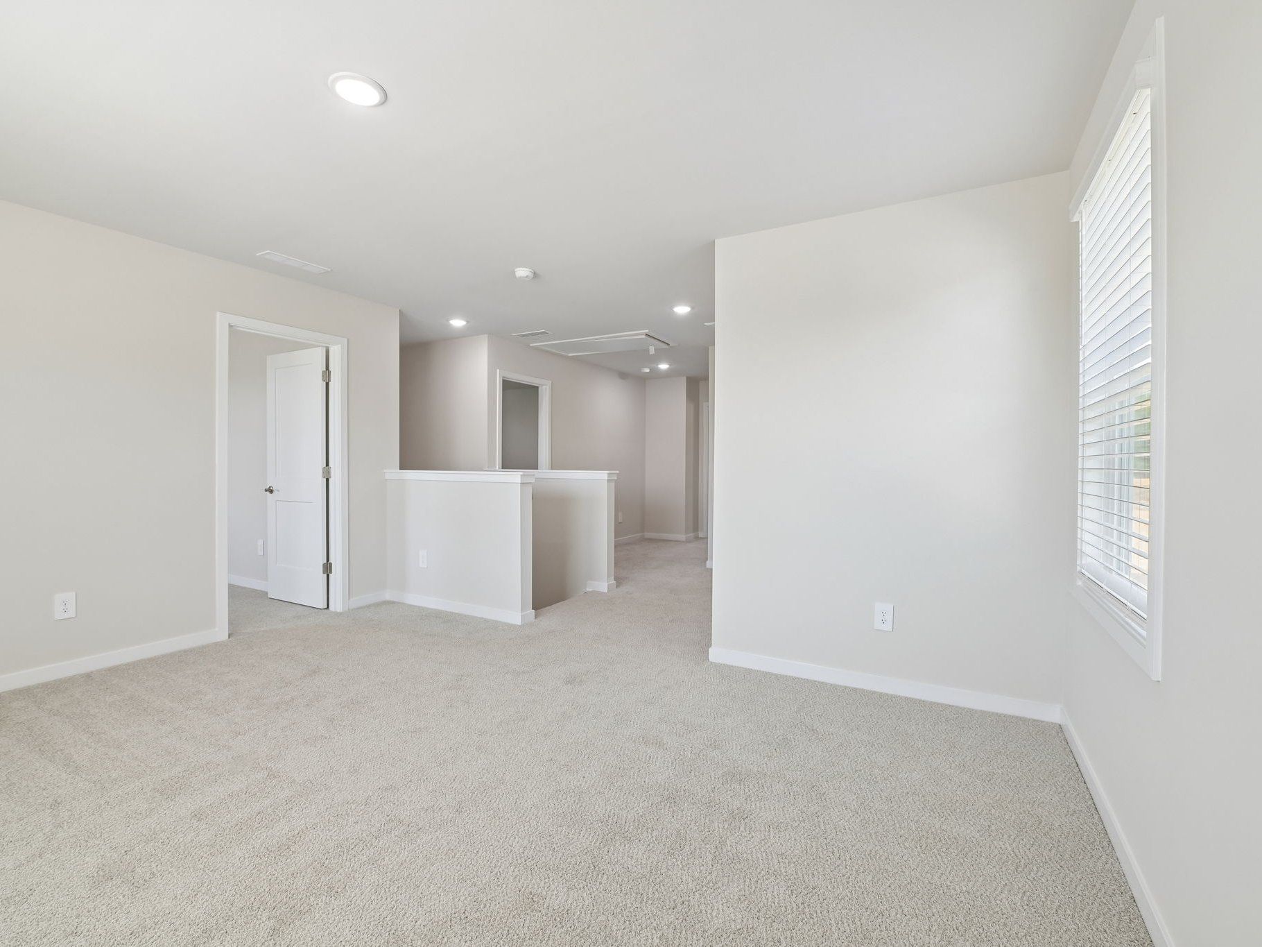 Loft in the Roswell floorplan at a Meritage Homes community in Wendell, NC.