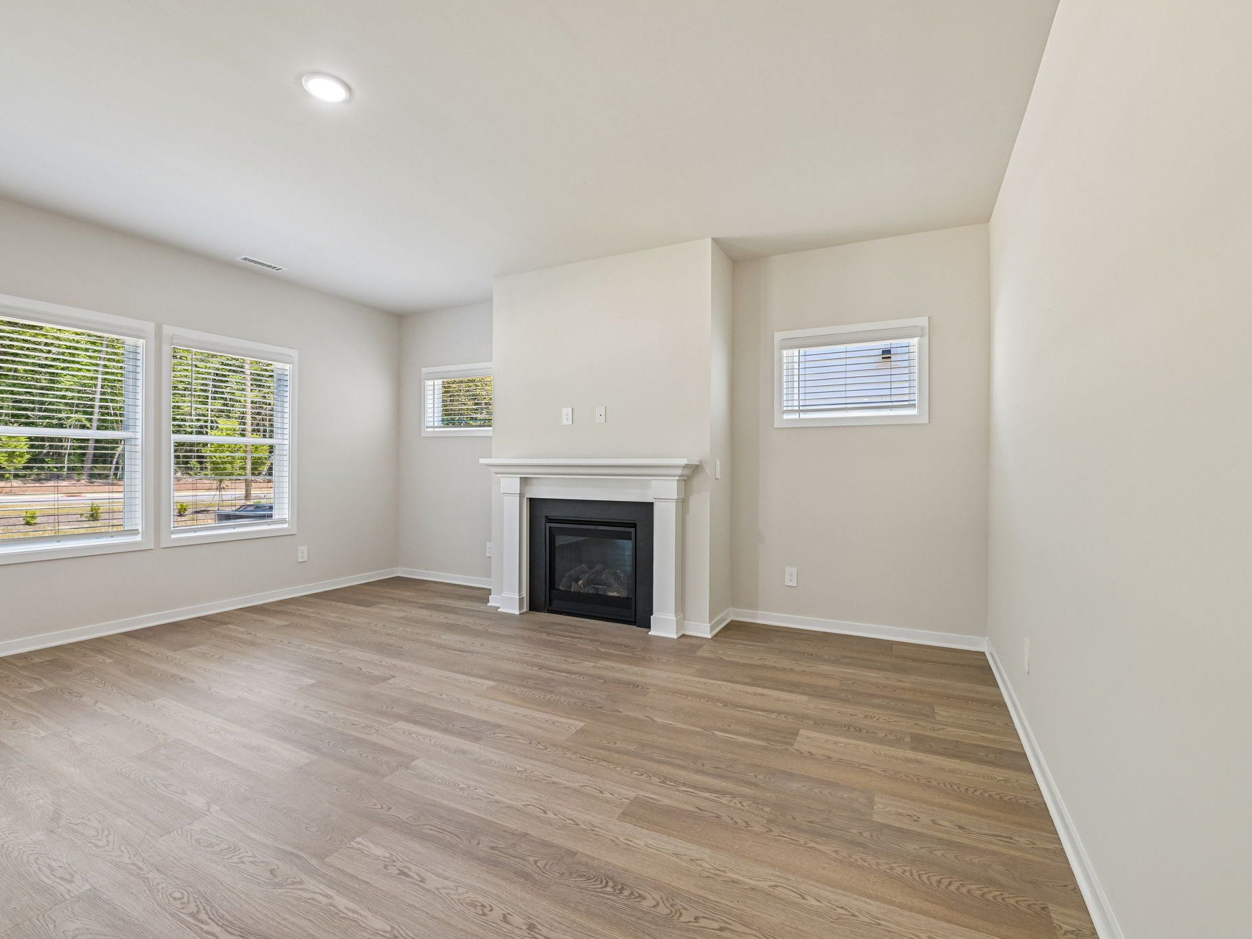 Great room the Taylorsville floorplan at a Meritage Homes community in Wendell, NC.
